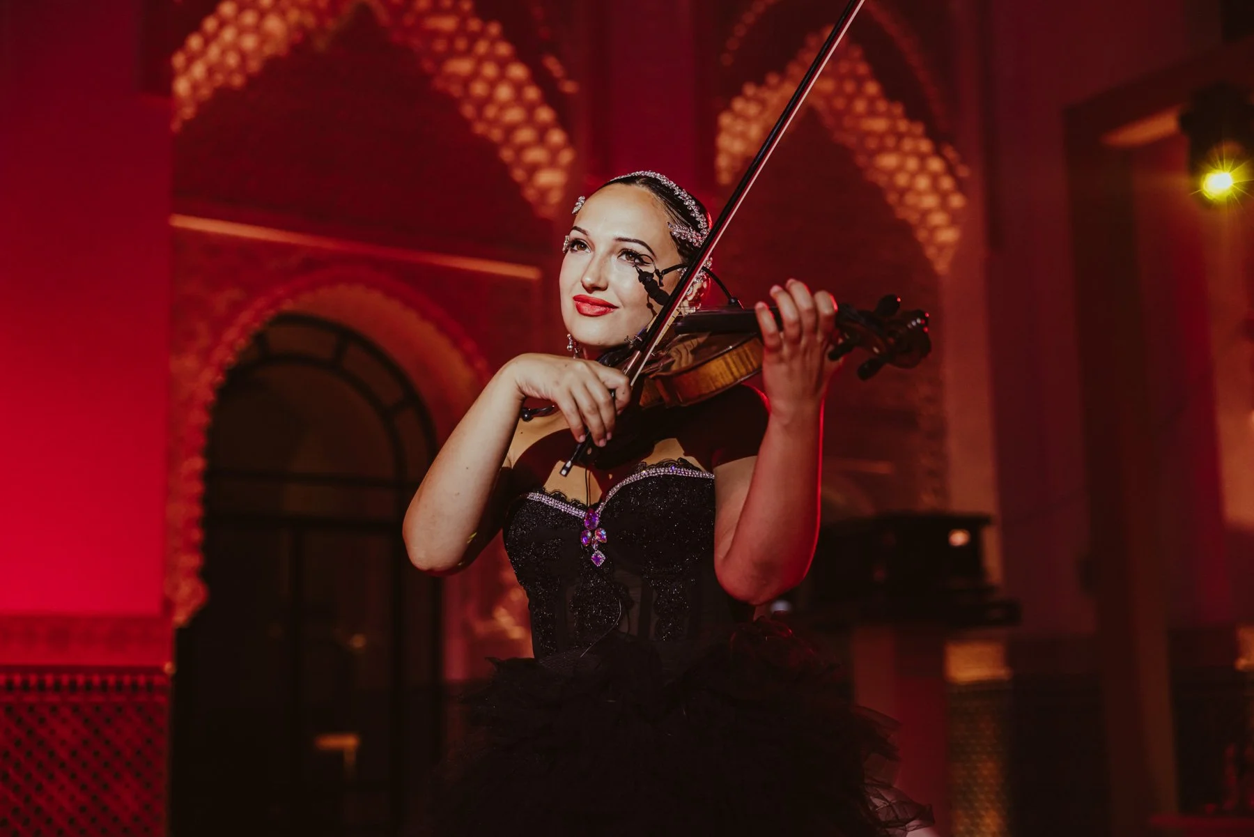 Violinist performing during live event
