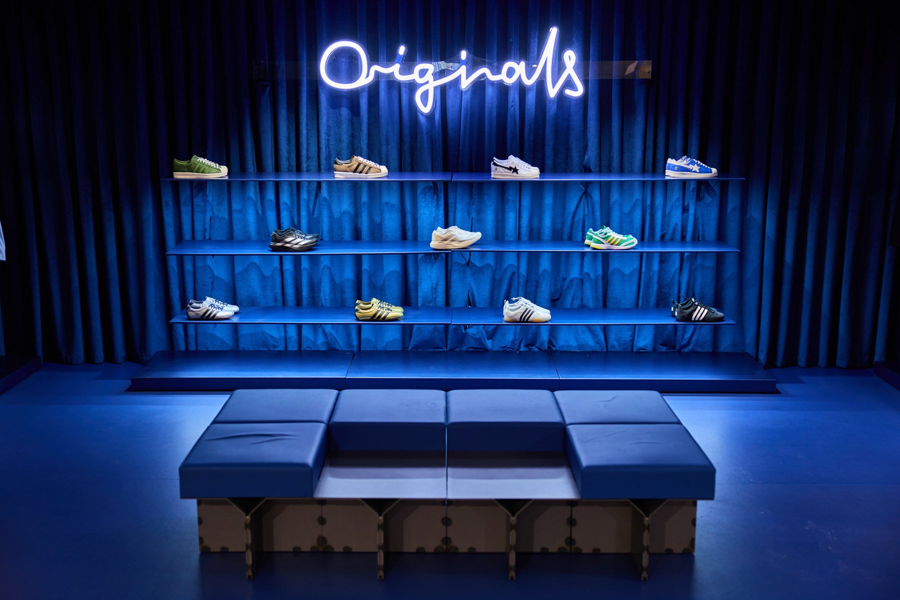 Contemporary retail interior featuring cultural archive display