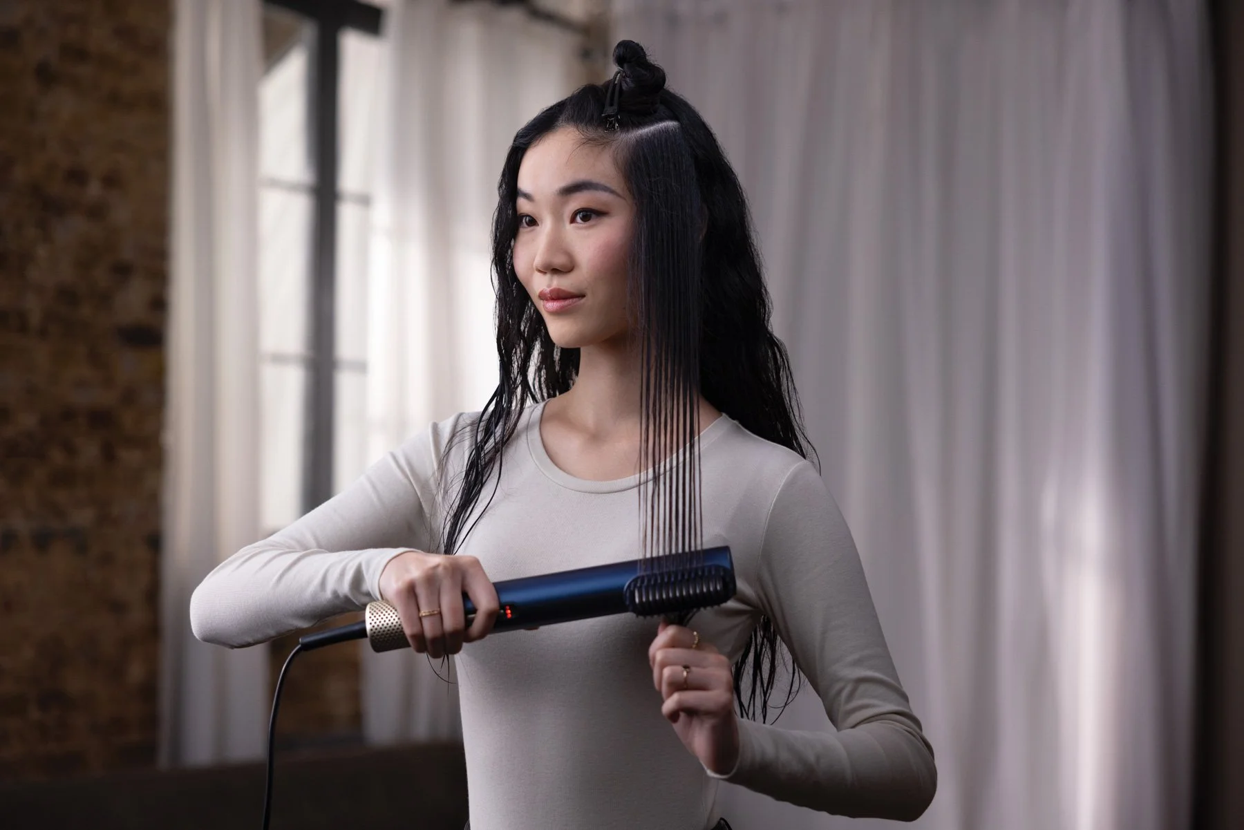 Advertising photography of model with BaByliss Air Wand