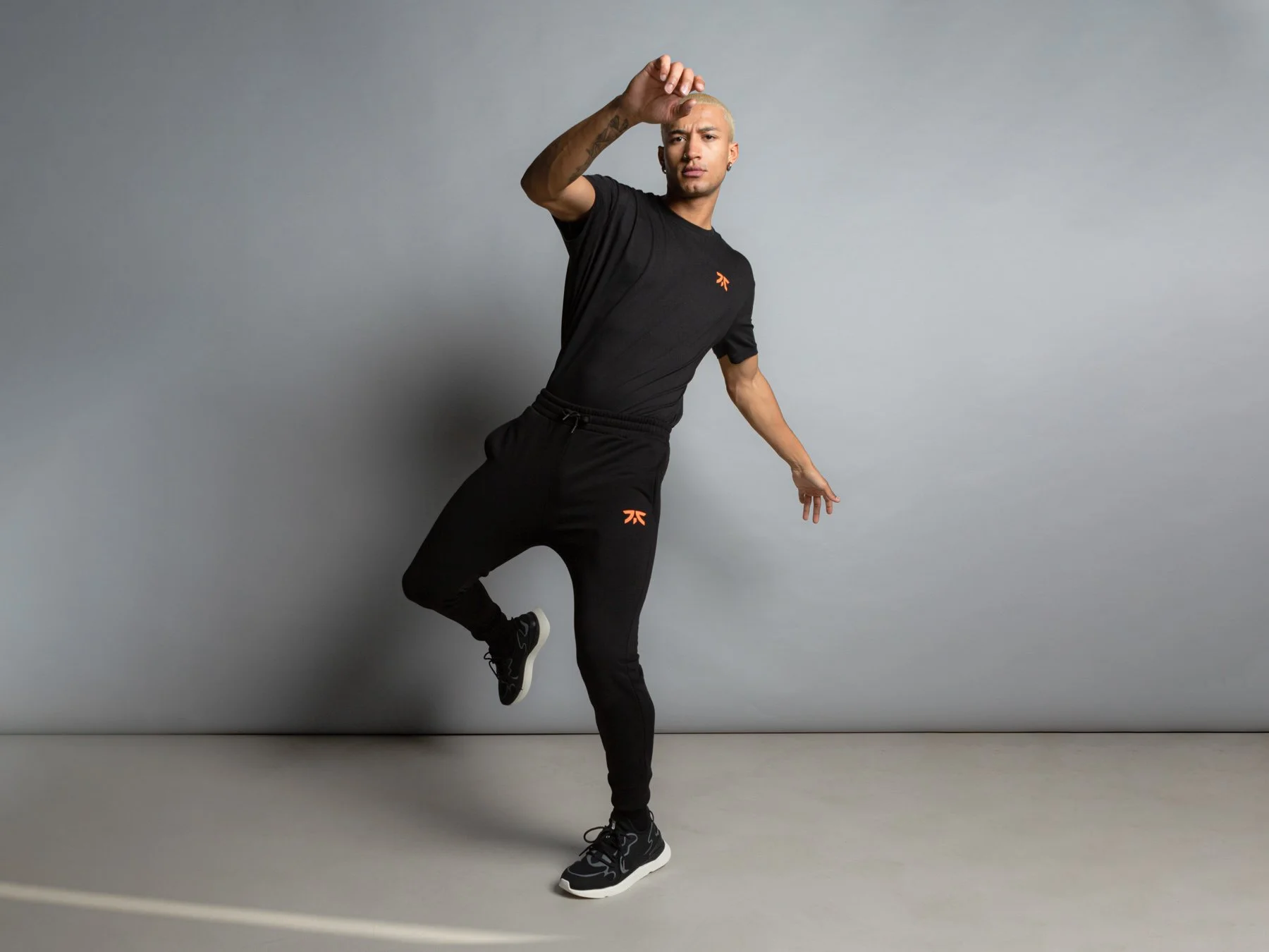 Studio fashion editorial of FNATIC streetwear look