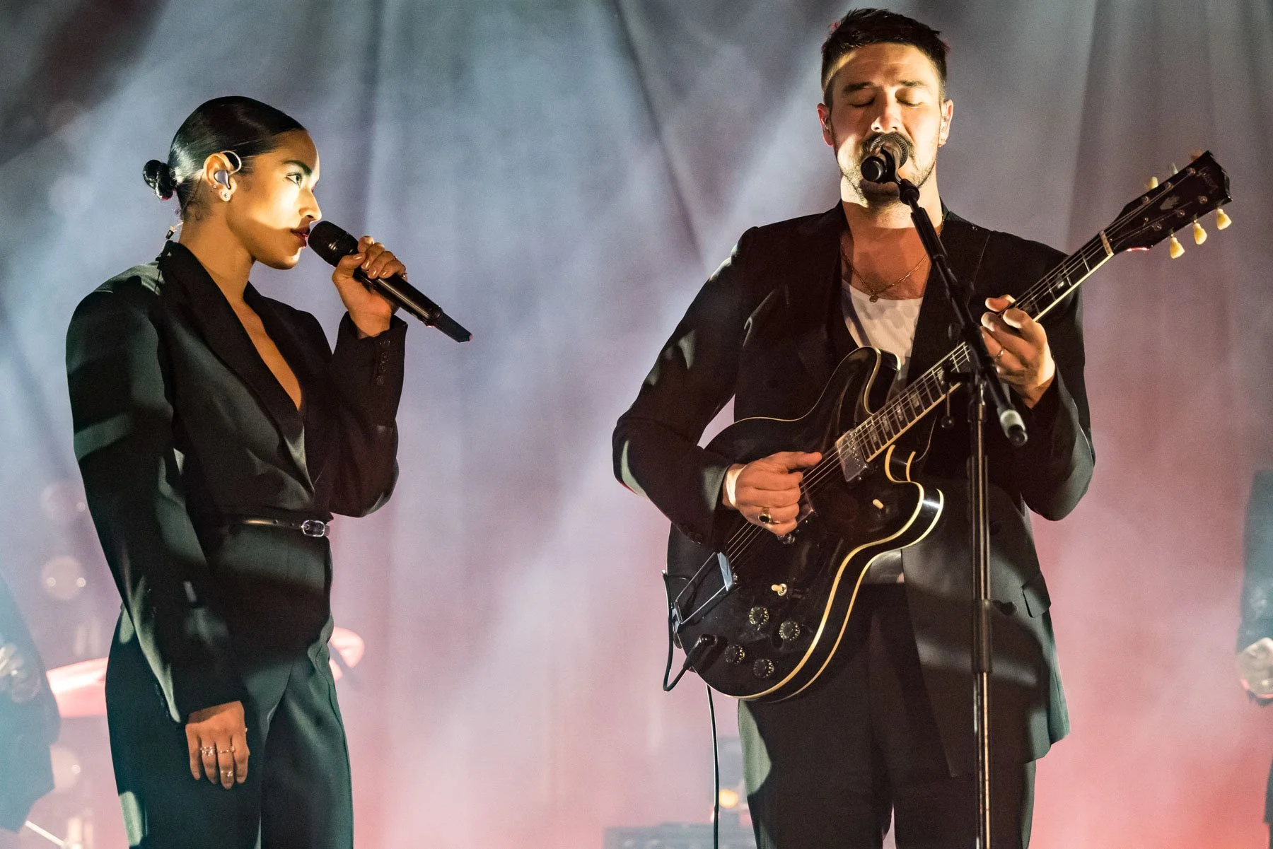 Live music photography of Marcus Mumford and guest performing at War Child Wassail