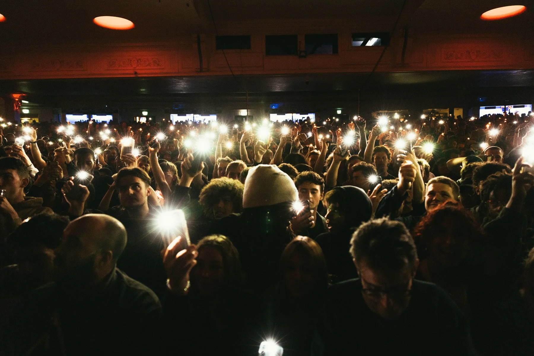 Live music photography of the crowd at an Action Bronson performance