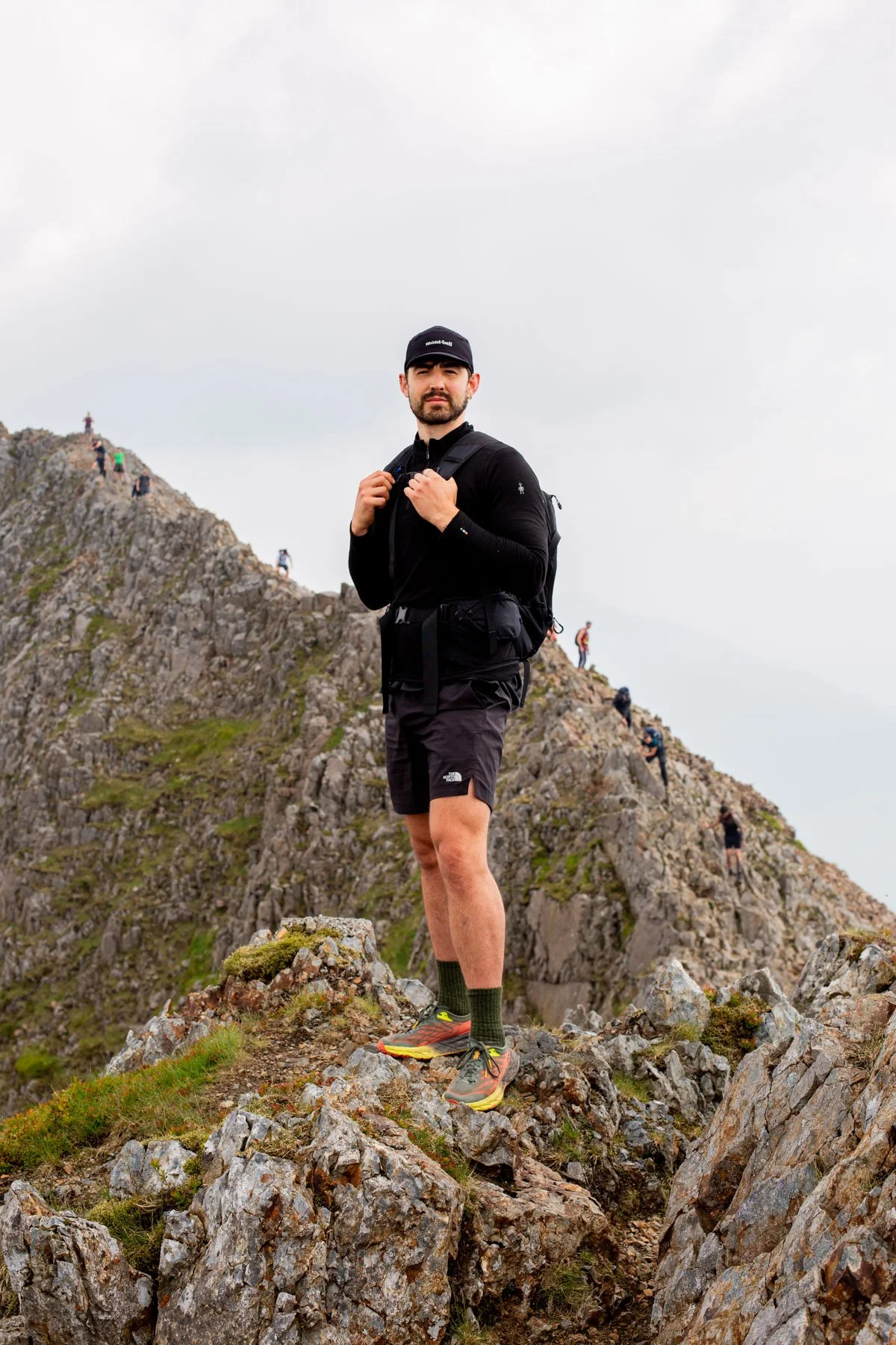 Austen standing on Crib Goch ridge