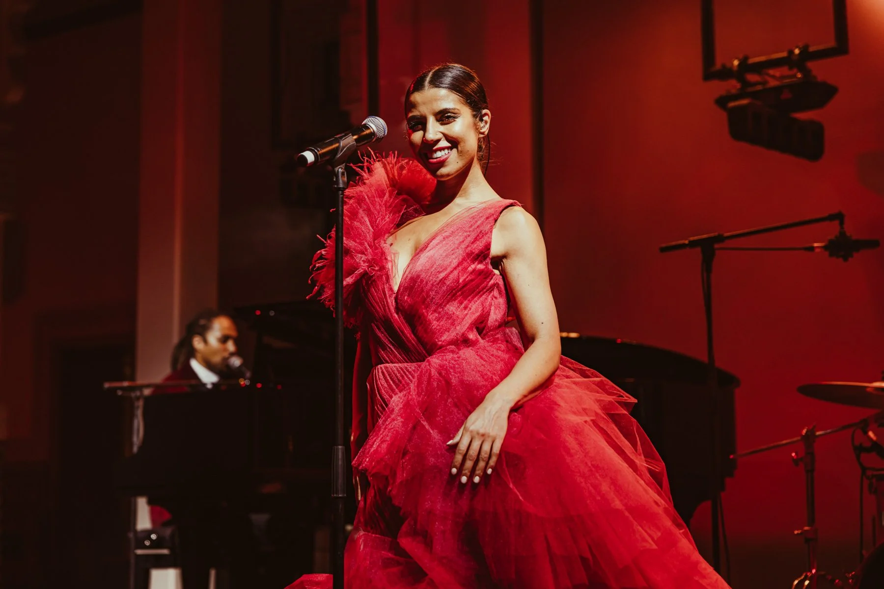 Performer on stage during live event