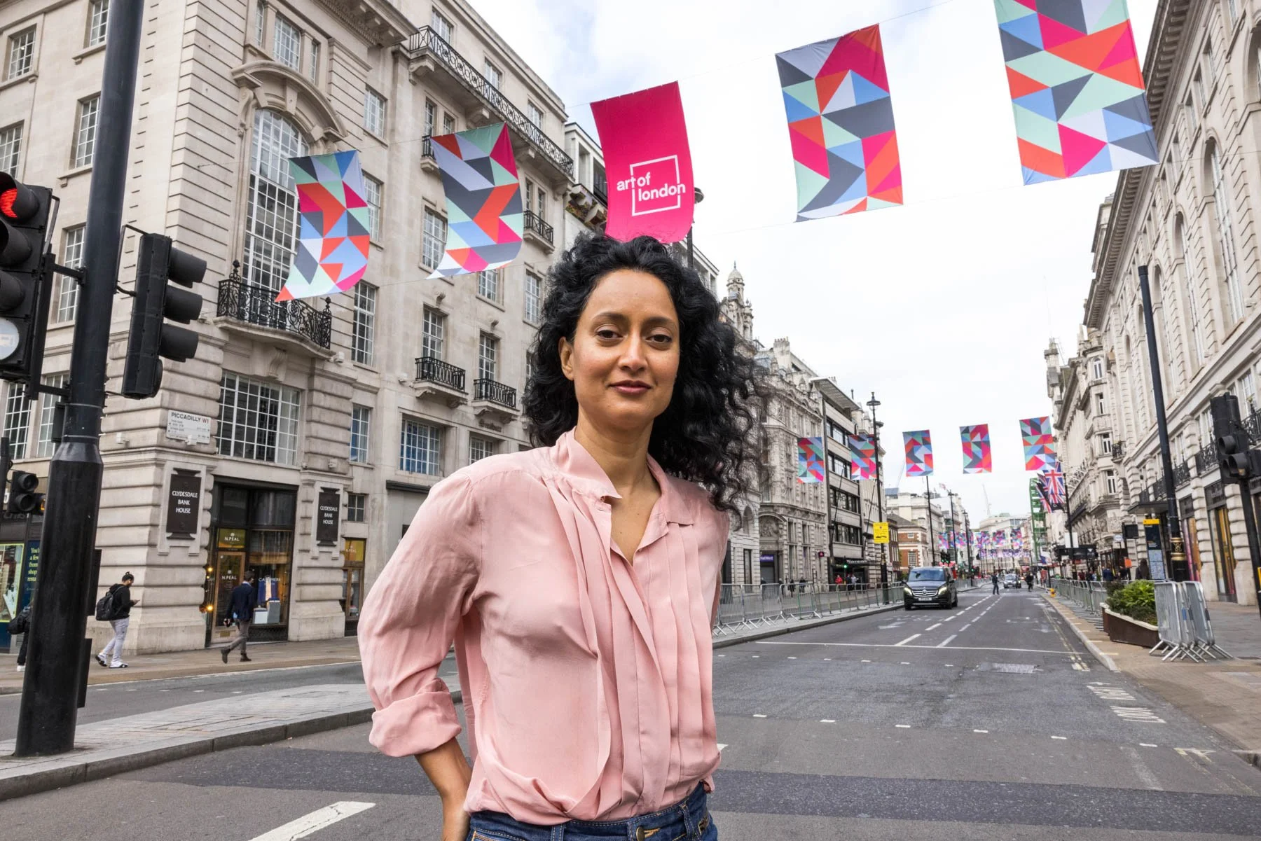 Commercial event photography of Rana Begum with flags in London