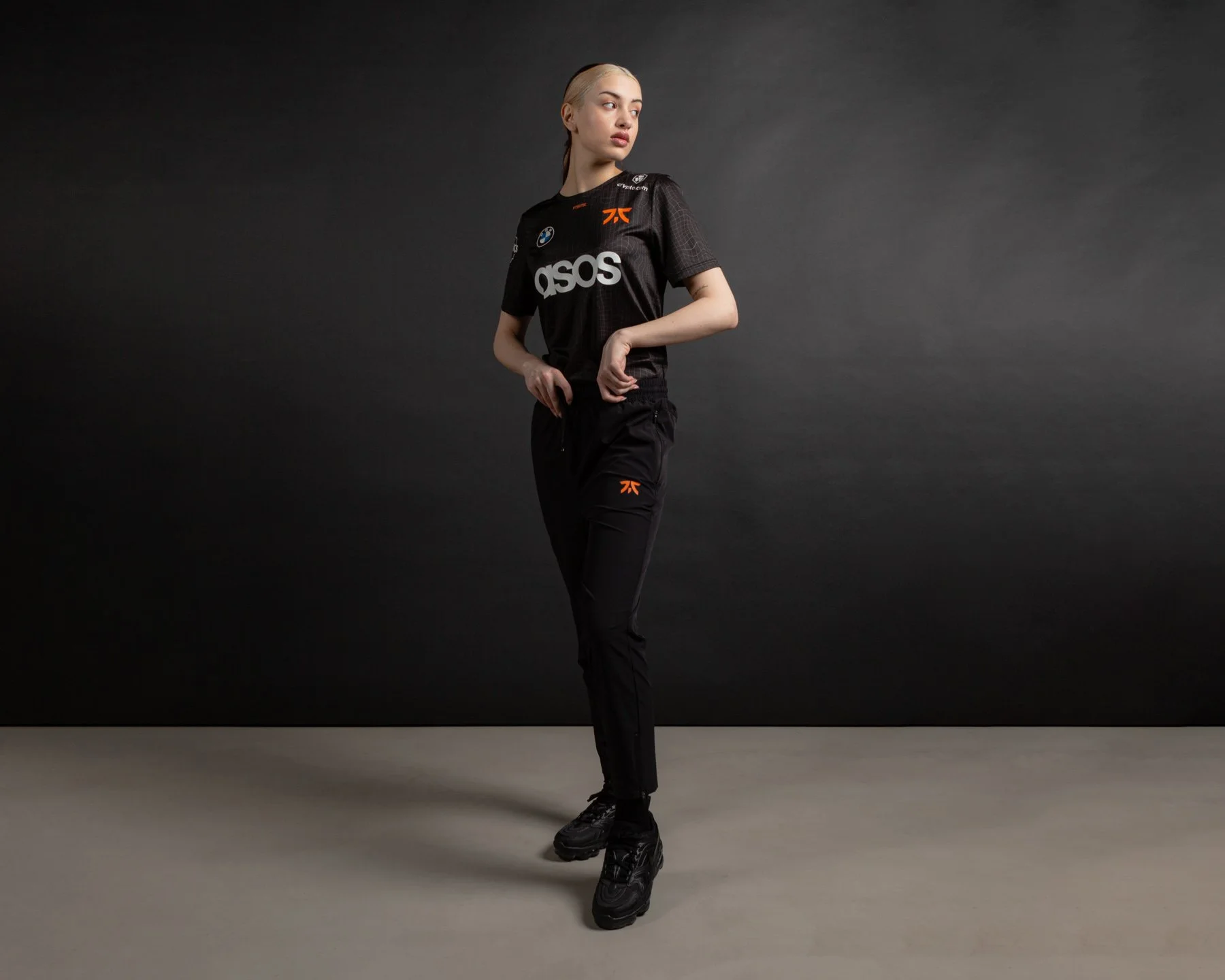 Editorial streetwear portrait featuring FNATIC apparel