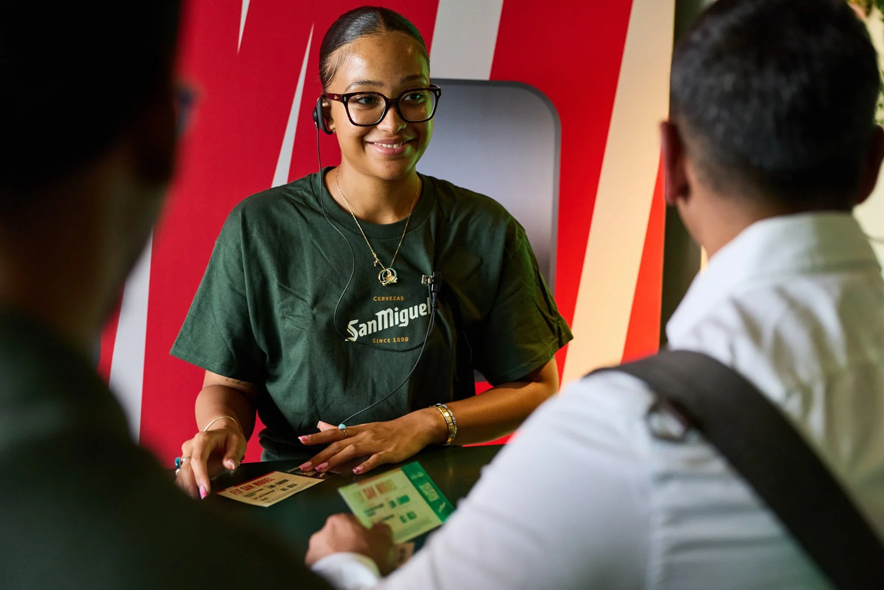 Brand event photography of host at San Miguel event