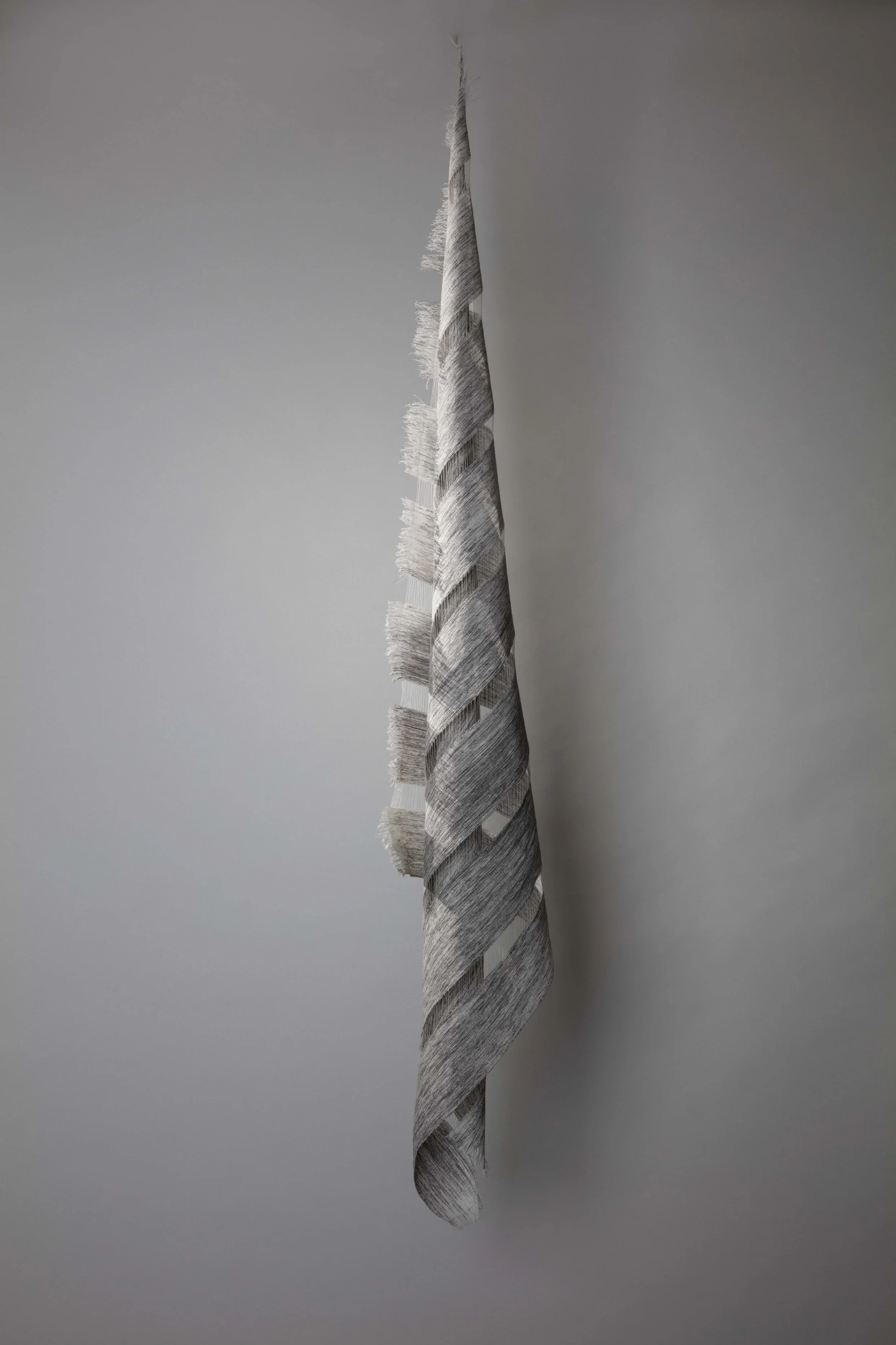  Handwoven paper and silk sculpture.  Ink-painted warp. (84 x 110cm) 