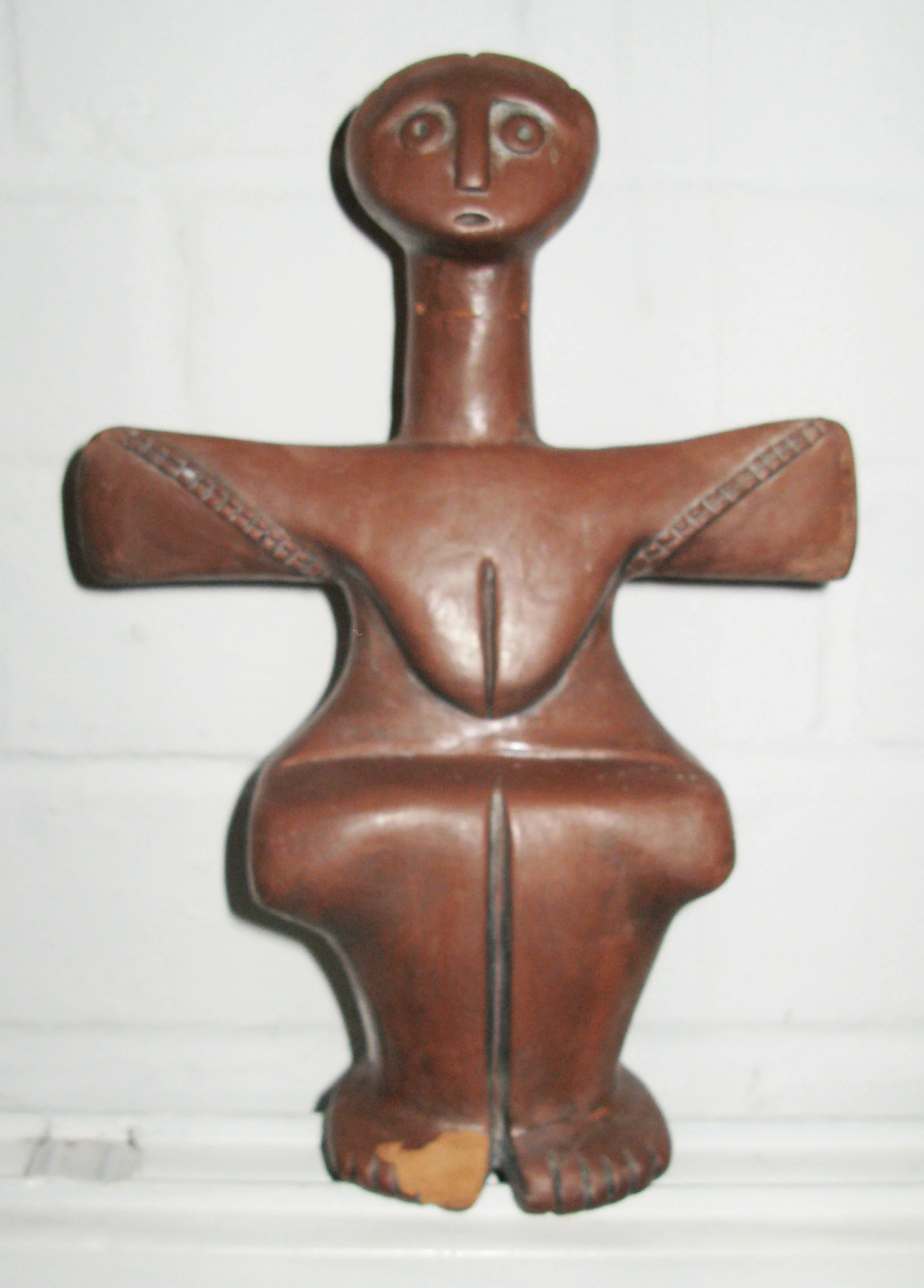 A ceramic copy of a large stone cruciform female figurine from the Chalcolithic period 3000-2500 B.C. (Copy)