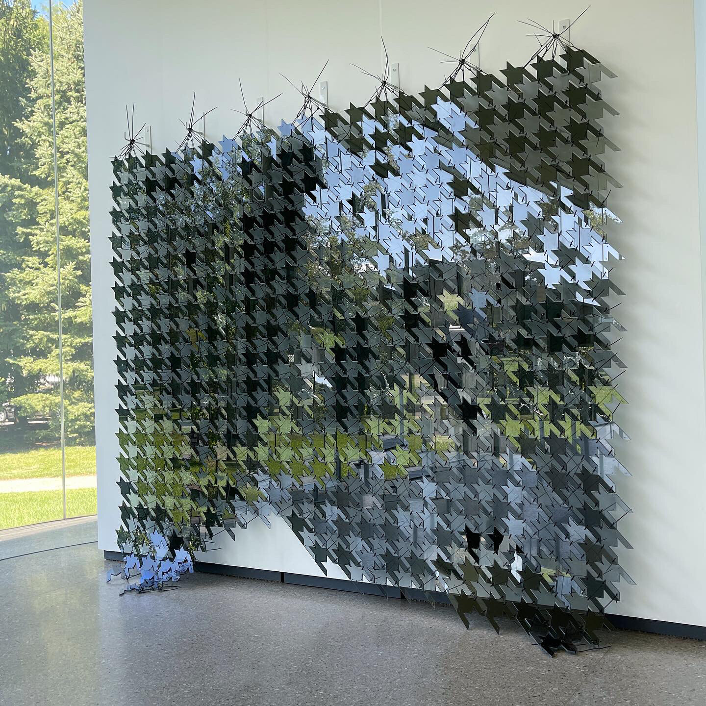   Cloak,  water jet cut glass, zip ties, 9’ x 8’  Shown here @ the Toledo Museum of Art  Collection of the Corning Museum of Glass 
