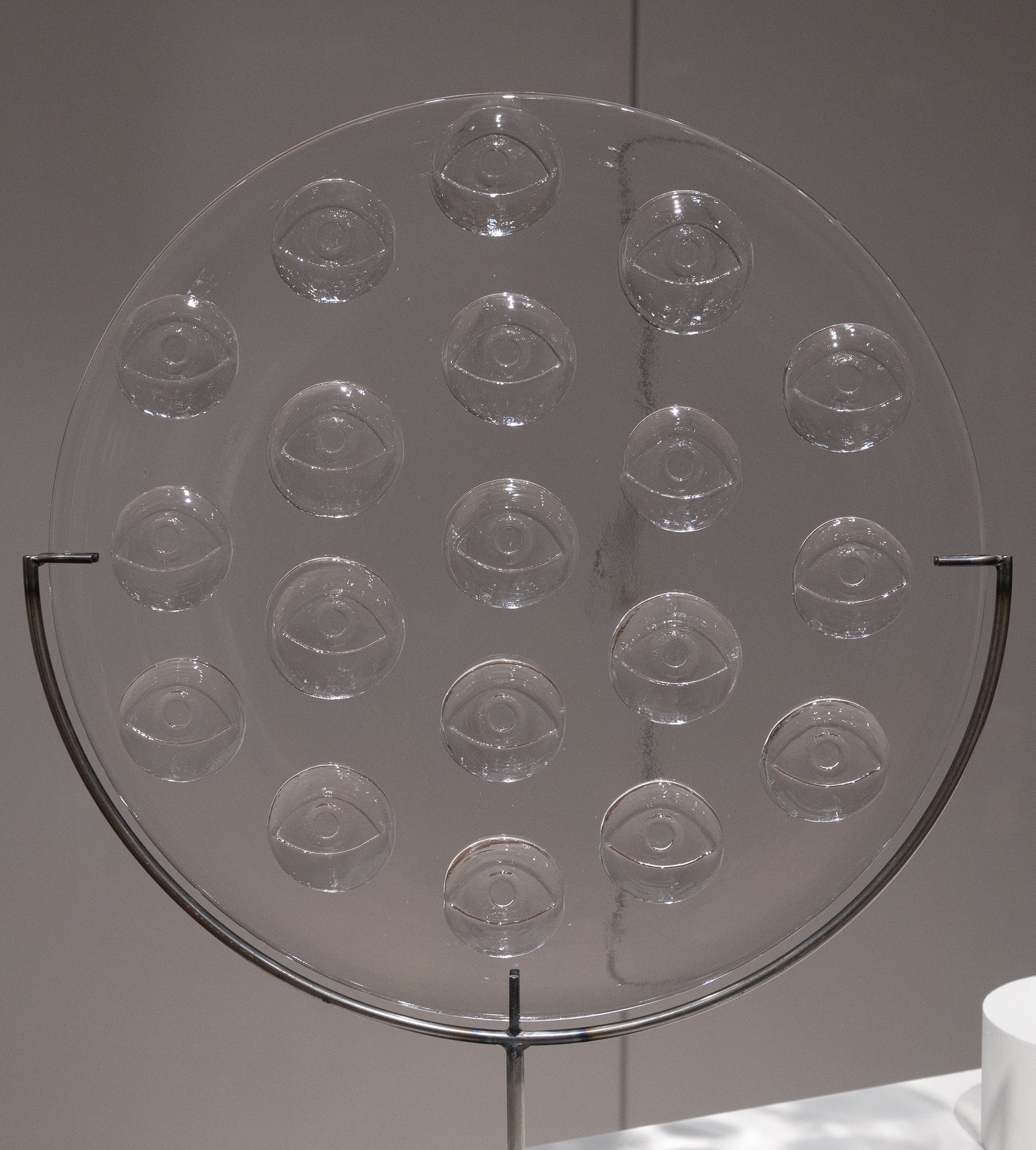 Receiver, 2025, blown and hot formed glass, steel. The Receiver series contends with the idea of layers of perception, the relationship between the conscious and unconscious, and the existence of an omnipresent but imperceptible observer. The