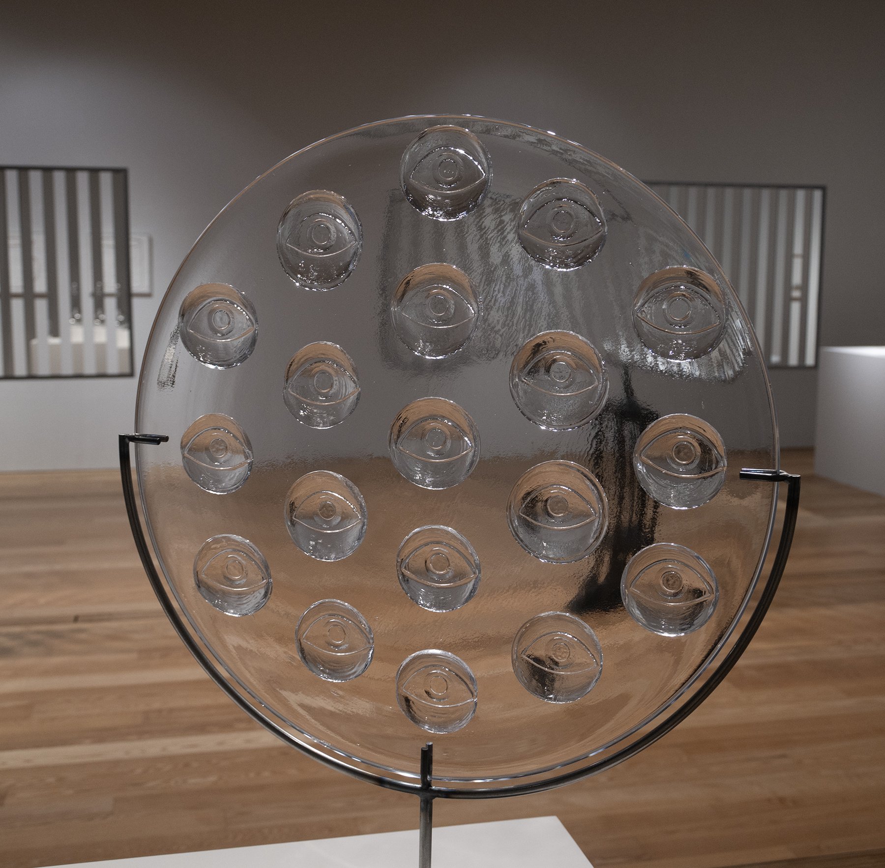 Receiver, 2025, blown and hot formed glass, steel. The Receiver series contends with the idea of layers of perception, the relationship between the conscious and unconscious, and the existence of an omnipresent but imperceptible observer. The