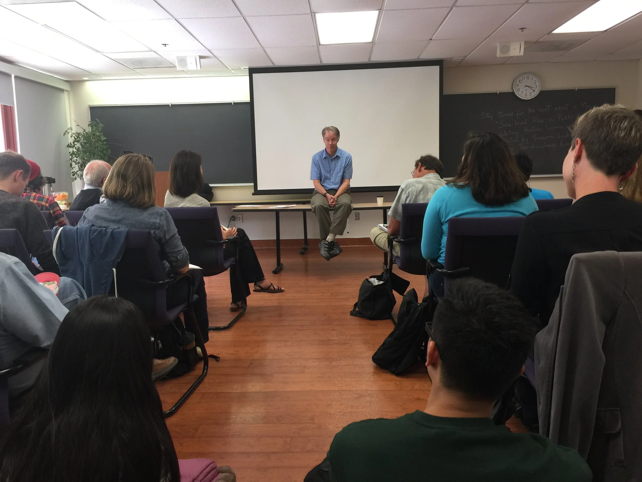 Kim Stanley Robinson speaking about climate change to a full house of UCSD students 