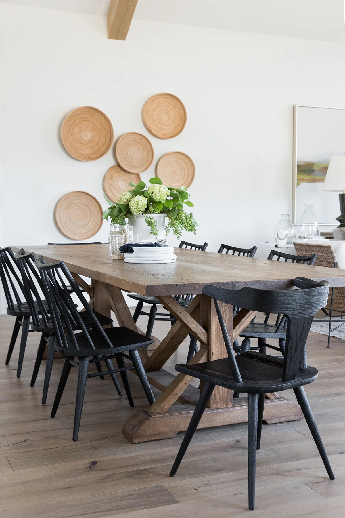 Dining+room+with+exposed+beams,+mismatched+chairs,+black+chairs+in+mountain+home+-+Studio+McGee+Design.jpg