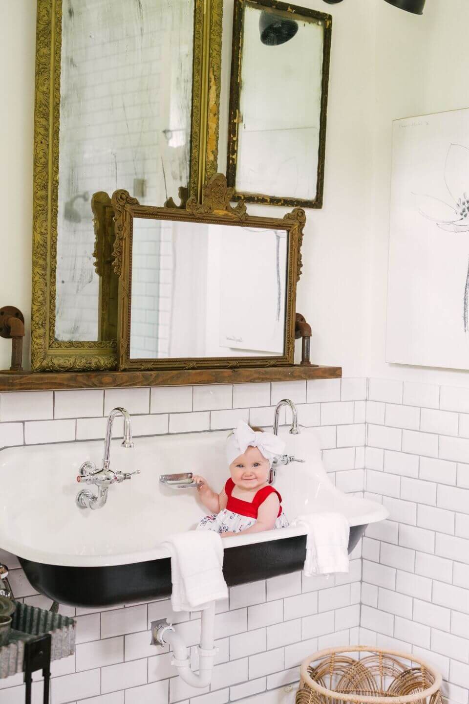 The Morrow House Home Tour - Historic Waco AirBnb - Cottage Home external - As Seen in Fixer Upper Season 5 - Vintage Mirrors Layered in Bathroom - Vintage Sink - Baby in Sink -万博赞助意大利甲级联赛农舍生活。jpg