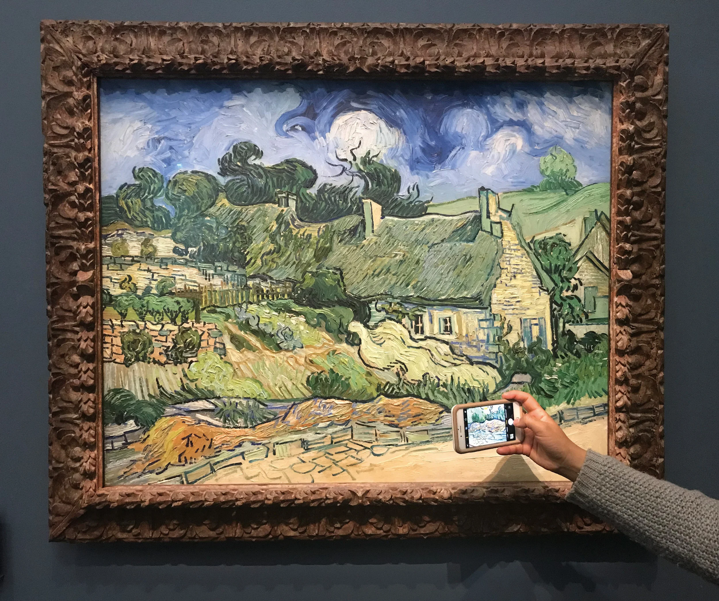 Somebody getting close to Thatched Cottages at Cordeville (1890) by Vincent van Gogh