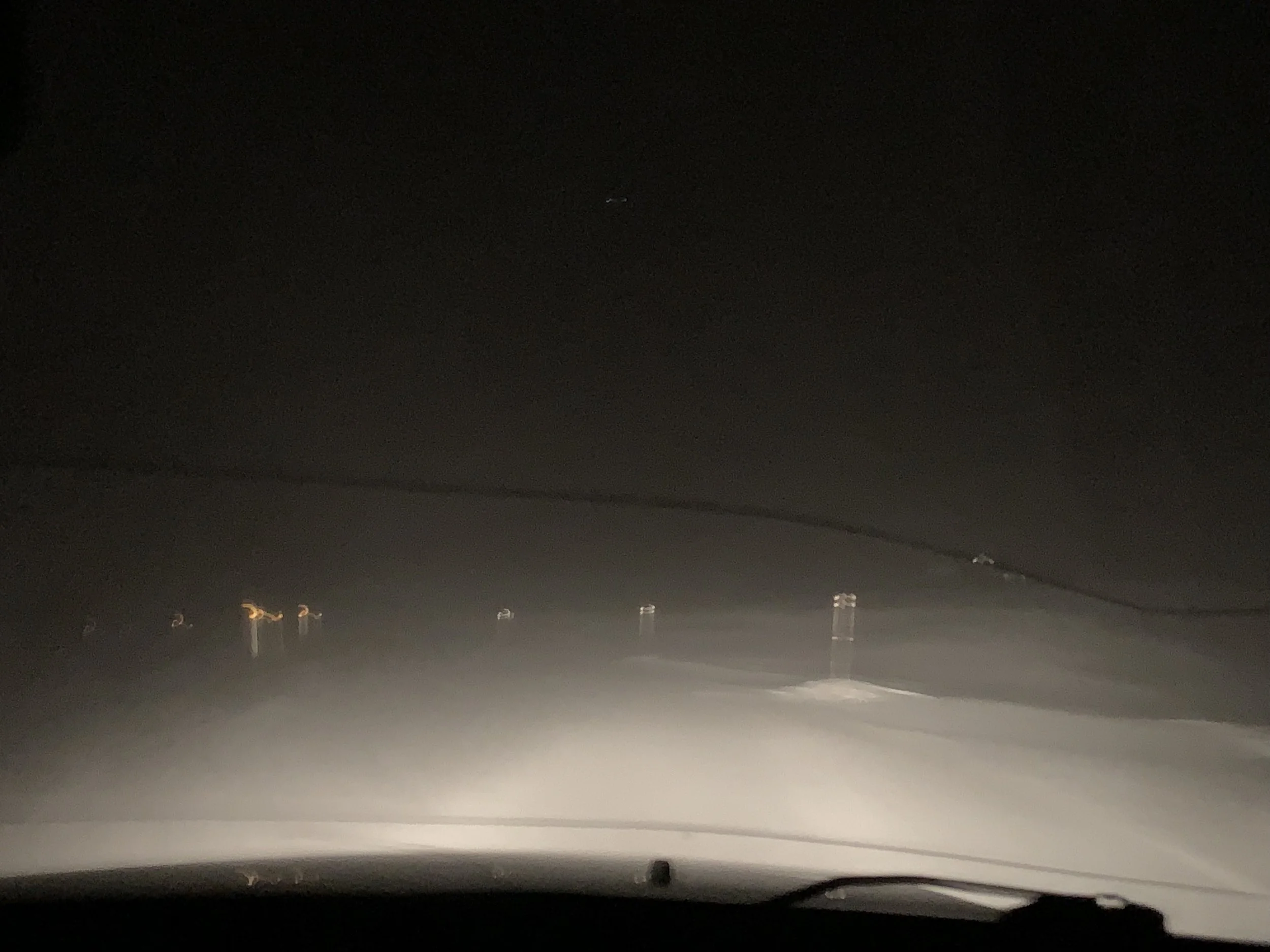 Ignore the crack in the windshield but a snowy, blowy night on the Big Horns.