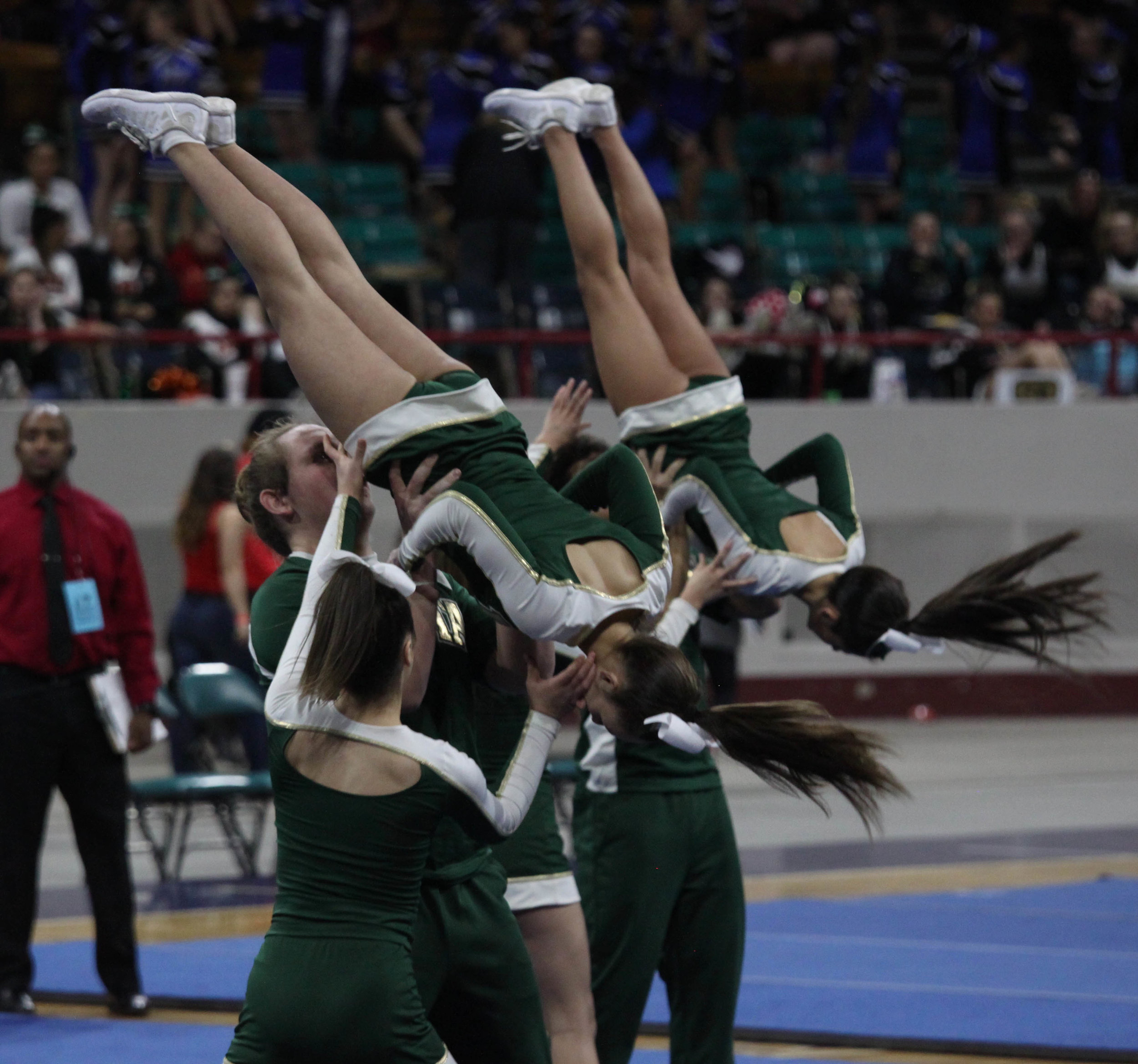 Vista cheerleaders preform during the state competition at the Denver Coleseum. 