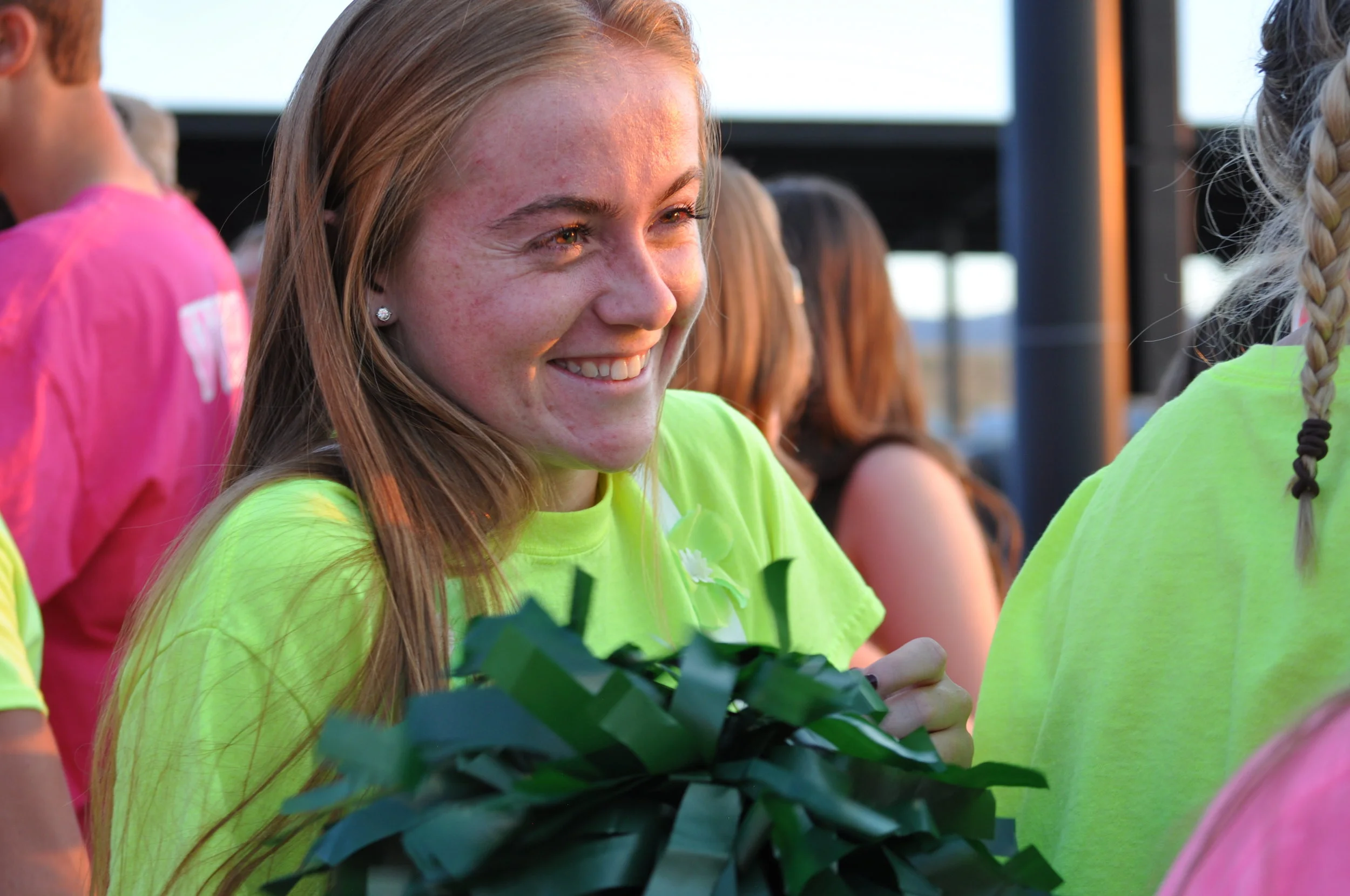  Senior Haley Schueppert smiles at the first home football game of the season.&nbsp; 