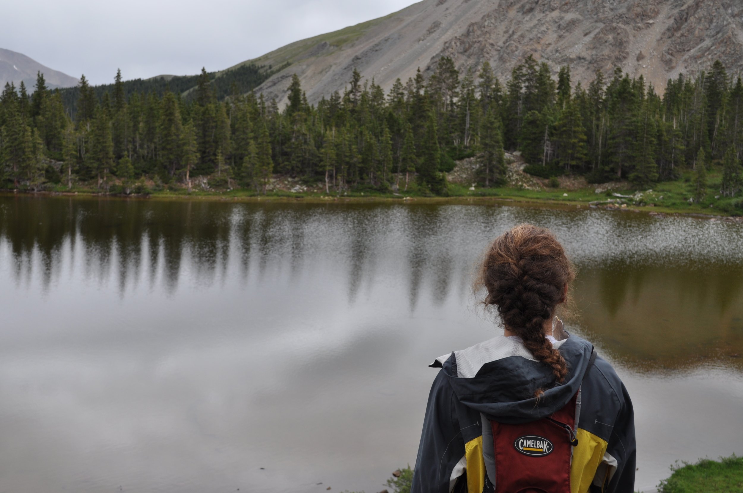  My friend Avery overlooks Ptarmigan Lake and takes in nature.&nbsp; 