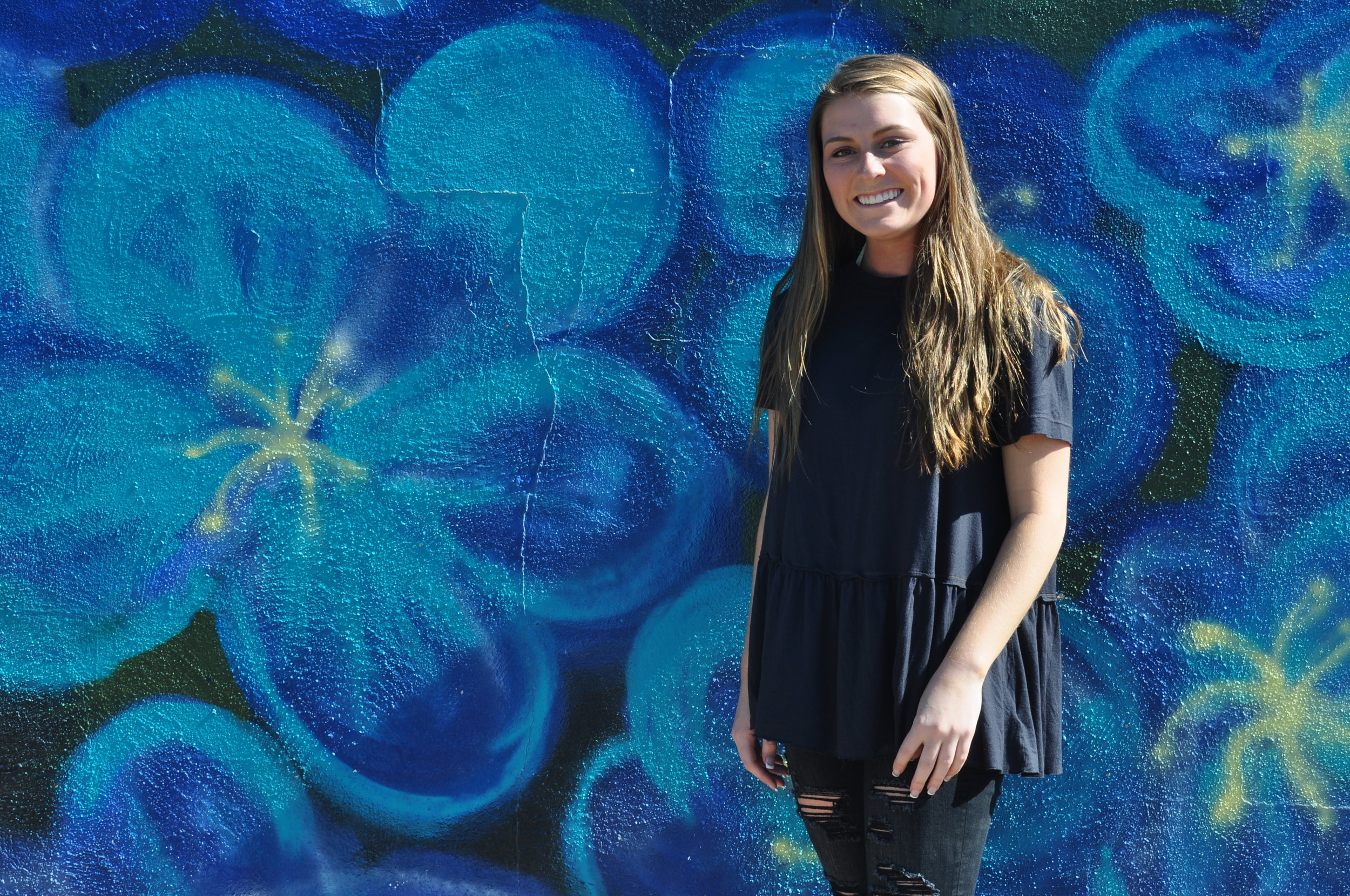  My good friend Abby posing in front of outdoor wall art in Scottsdale, Ariz.&nbsp; 