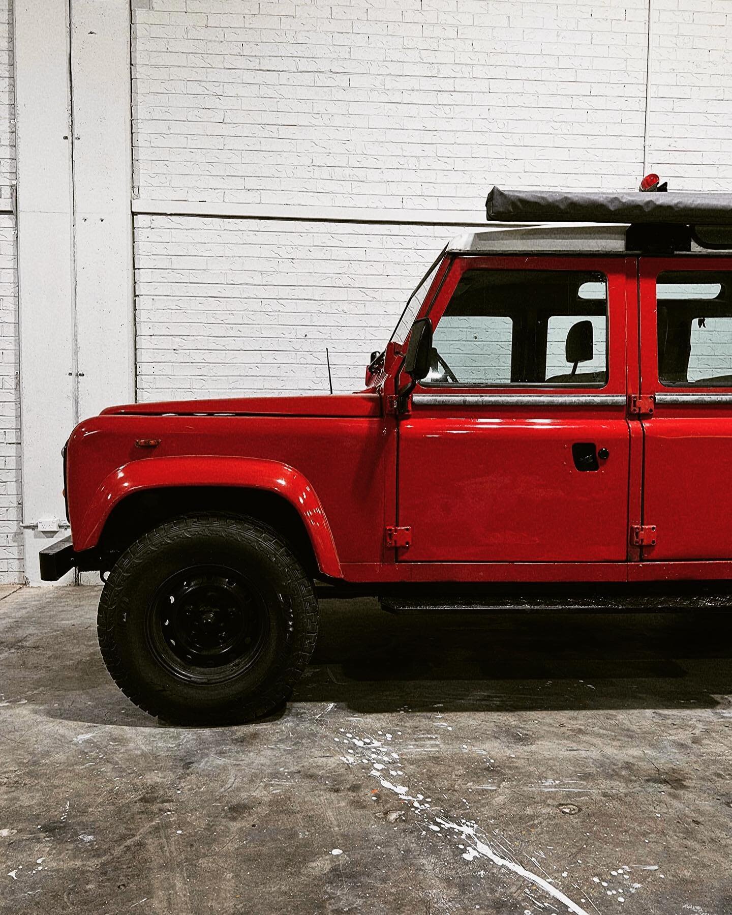 Big Red really buffed up. It&rsquo;s crazy how well the original acrylic paint came up with a little cut &amp; polish
.
.
📸 @crossmedia_group 
.
.
.
#charmer #charmedyourwayintoourhearts #stopit #defender #county #landrovercounty #landrover110
