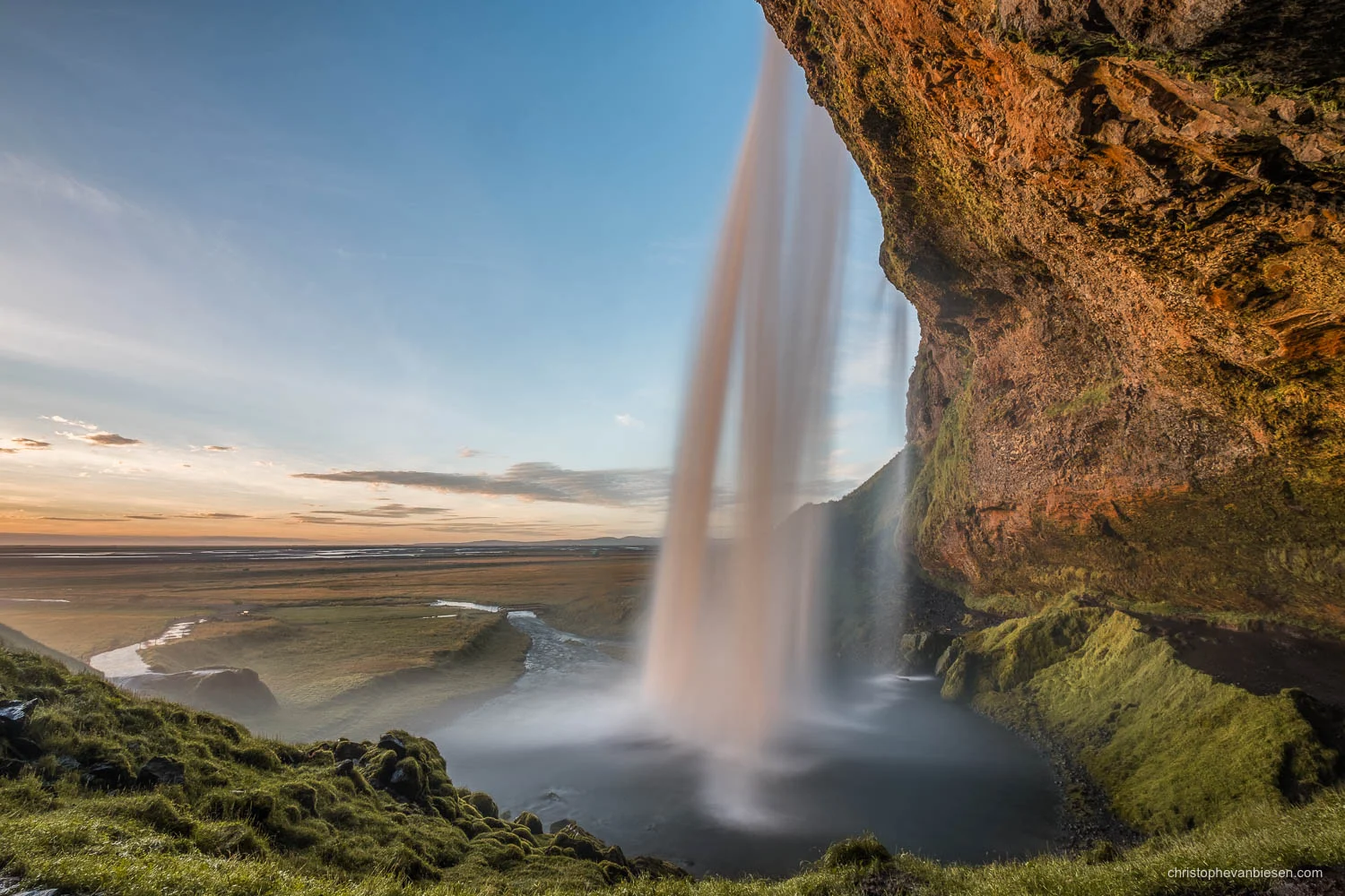 Seljalandsfoss - Iceland - Behind the waterfall of Seljalandsfoss during a September sunset