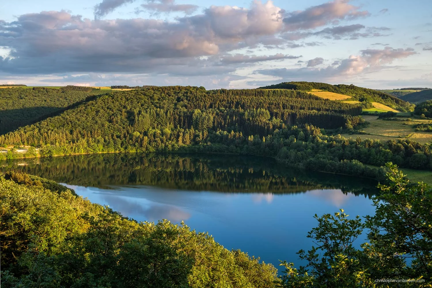 Luxembourg - Reflection of the green forests surrounding Luxembourg's Upper-Sûre Lake - Summer Mirage
