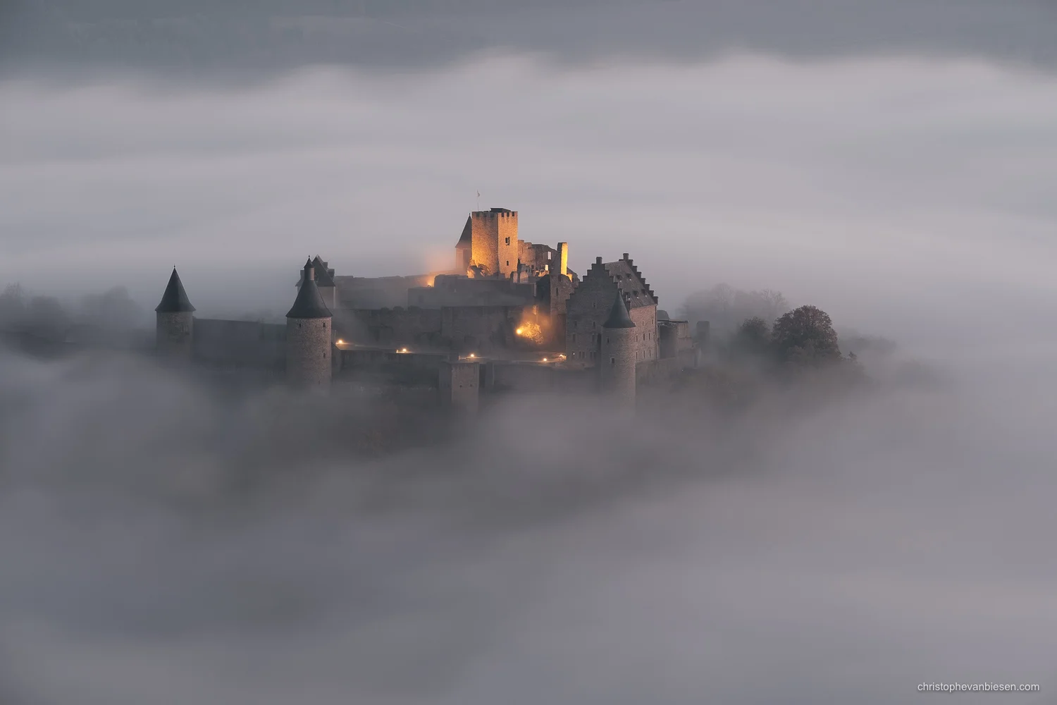 Bourscheid Castle in the fog - Chateau de Bourscheid - Luxembourg - Bourscheid Castle at night emerging from the fog - Veiled by Shadows and Fog