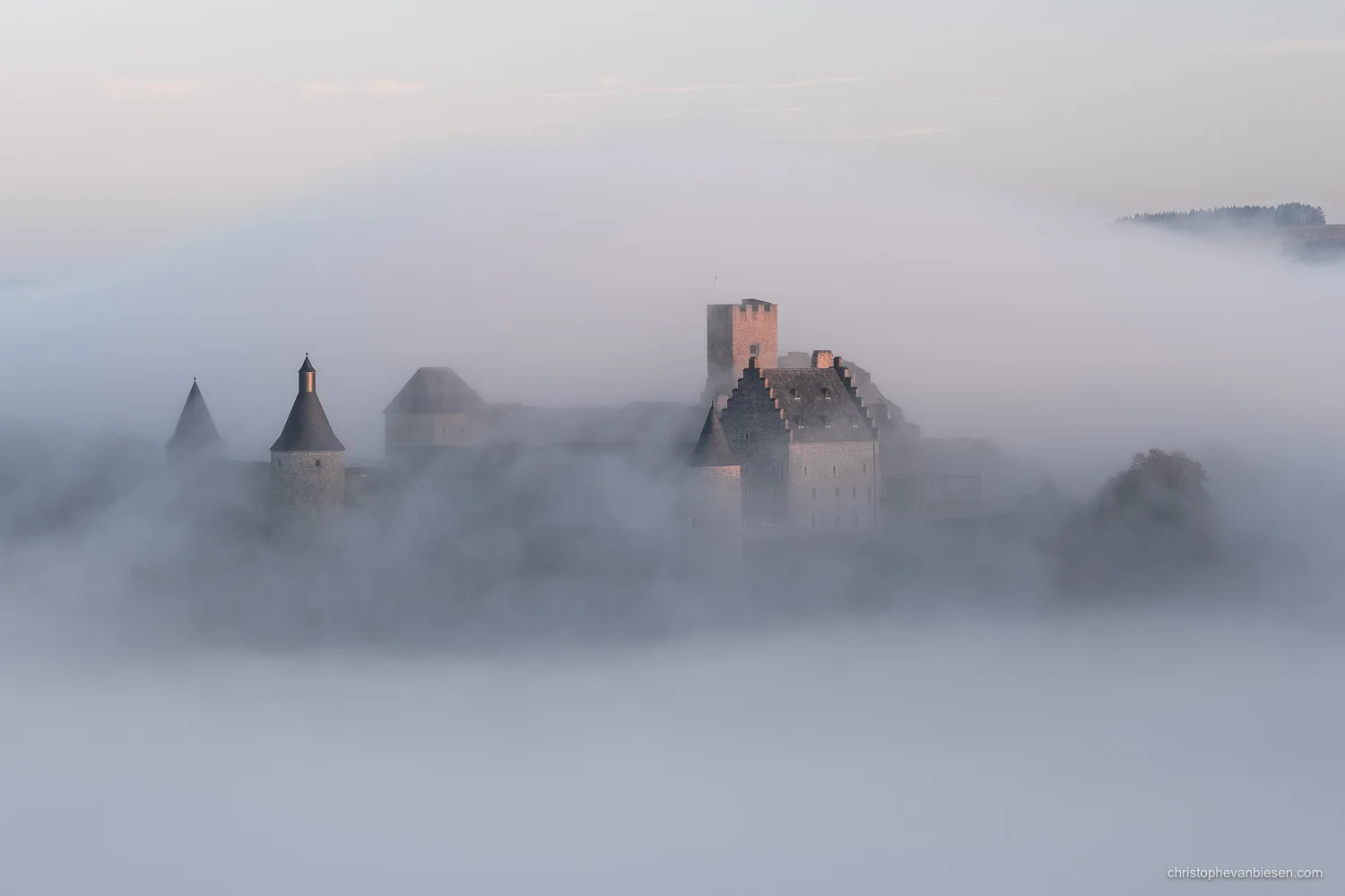 Bourscheid Castle in the fog - Chateau de Bourscheid - Luxembourg - Bourscheid Castle engulfed by inverted clouds on an autumn morning - Tidal Wave