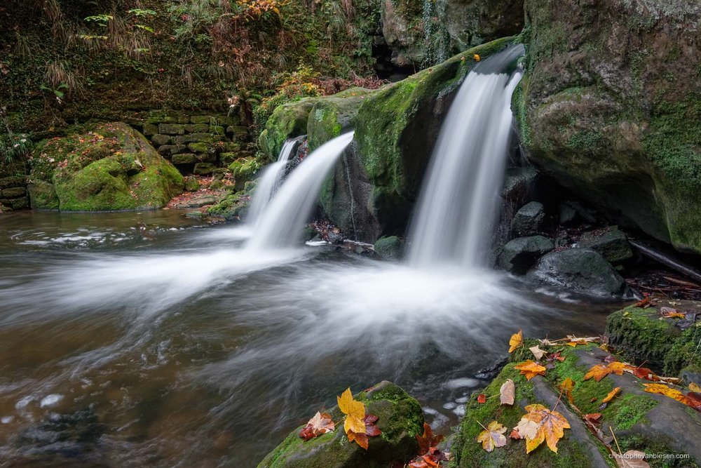 Visit the Mullerthal - Luxembourg - Fall at the Mullerthal's Schiessentumpel waterfall - Roaring Waters