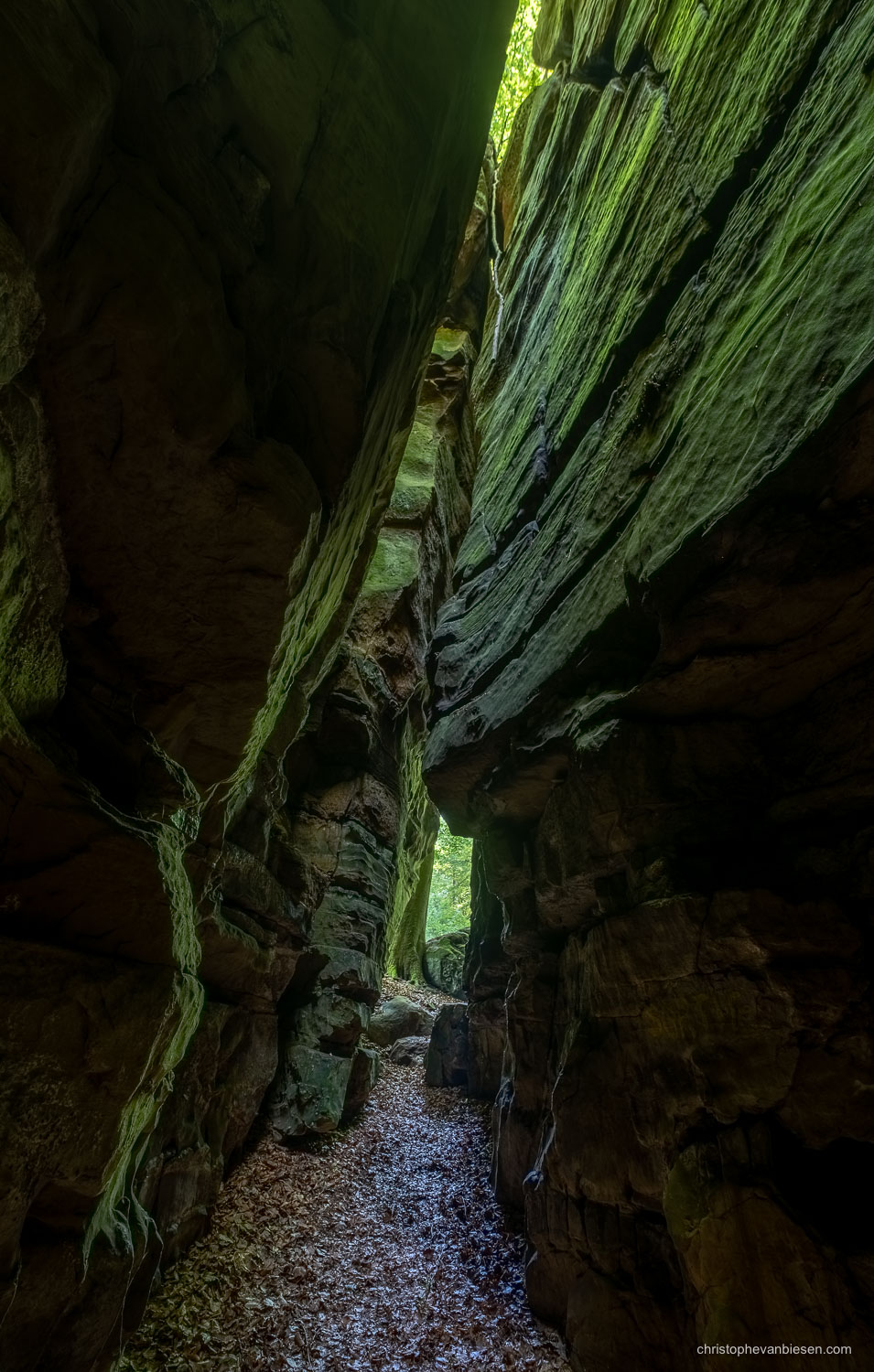 Visit the Mullerthal - Luxembourg - Narrow passage in the Mullerthal's Goldfralay caves in eastern Luxembourg - Green Canyon