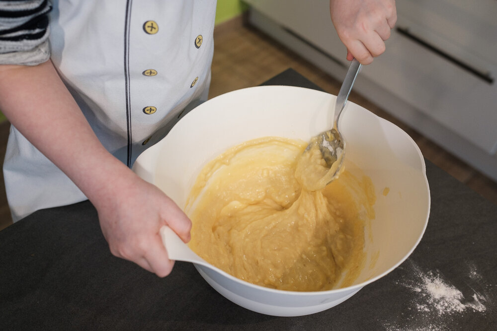 Baking a cake is a fun activity to do with your child.