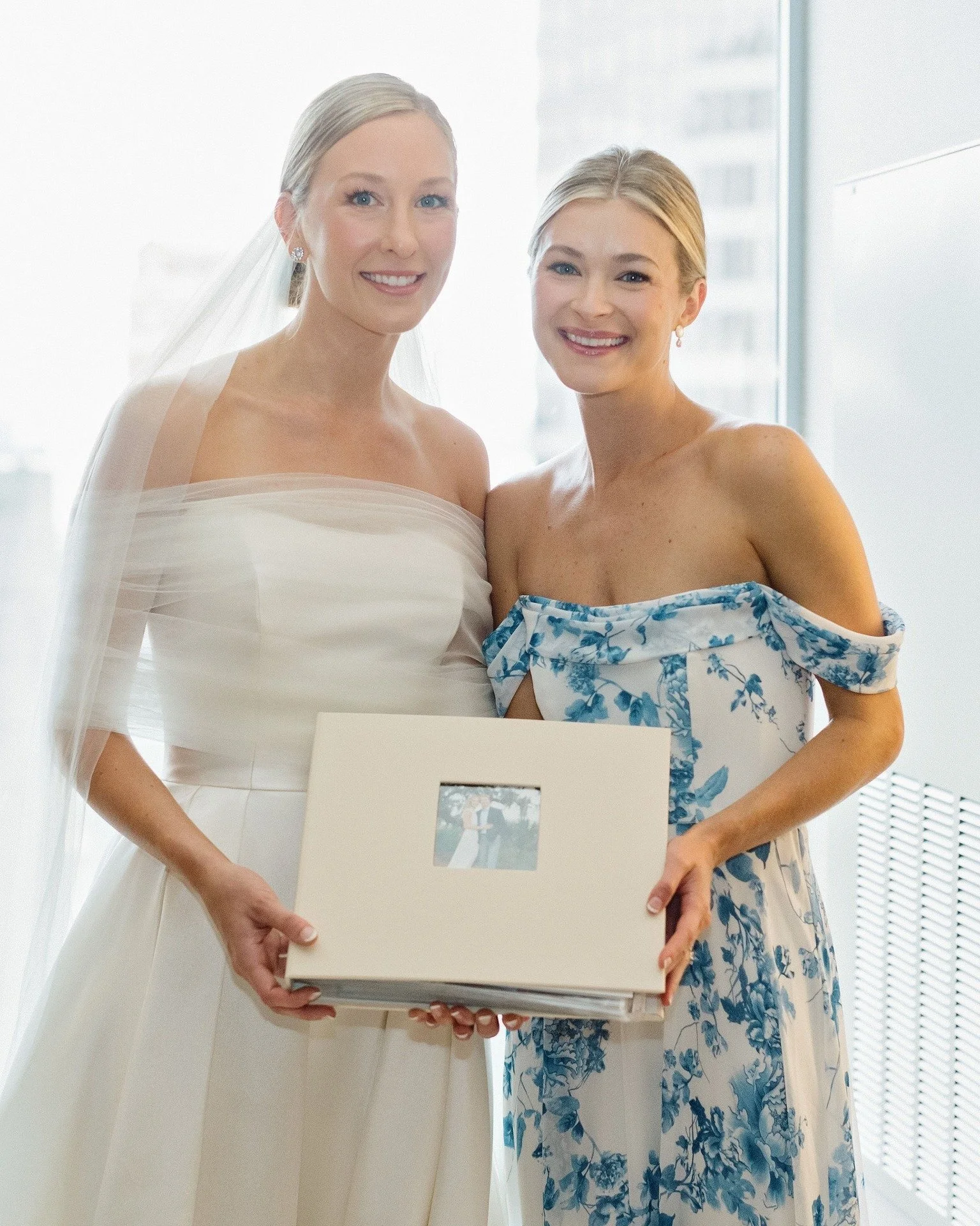 One of the most heartfelt gifts we've seen recently is a scrapbook created by friends and family. It's given to the bride as she's getting ready on her wedding day&mdash;and it never fails to bring tears to her eyes!

Photographer @amyarringtonphotog