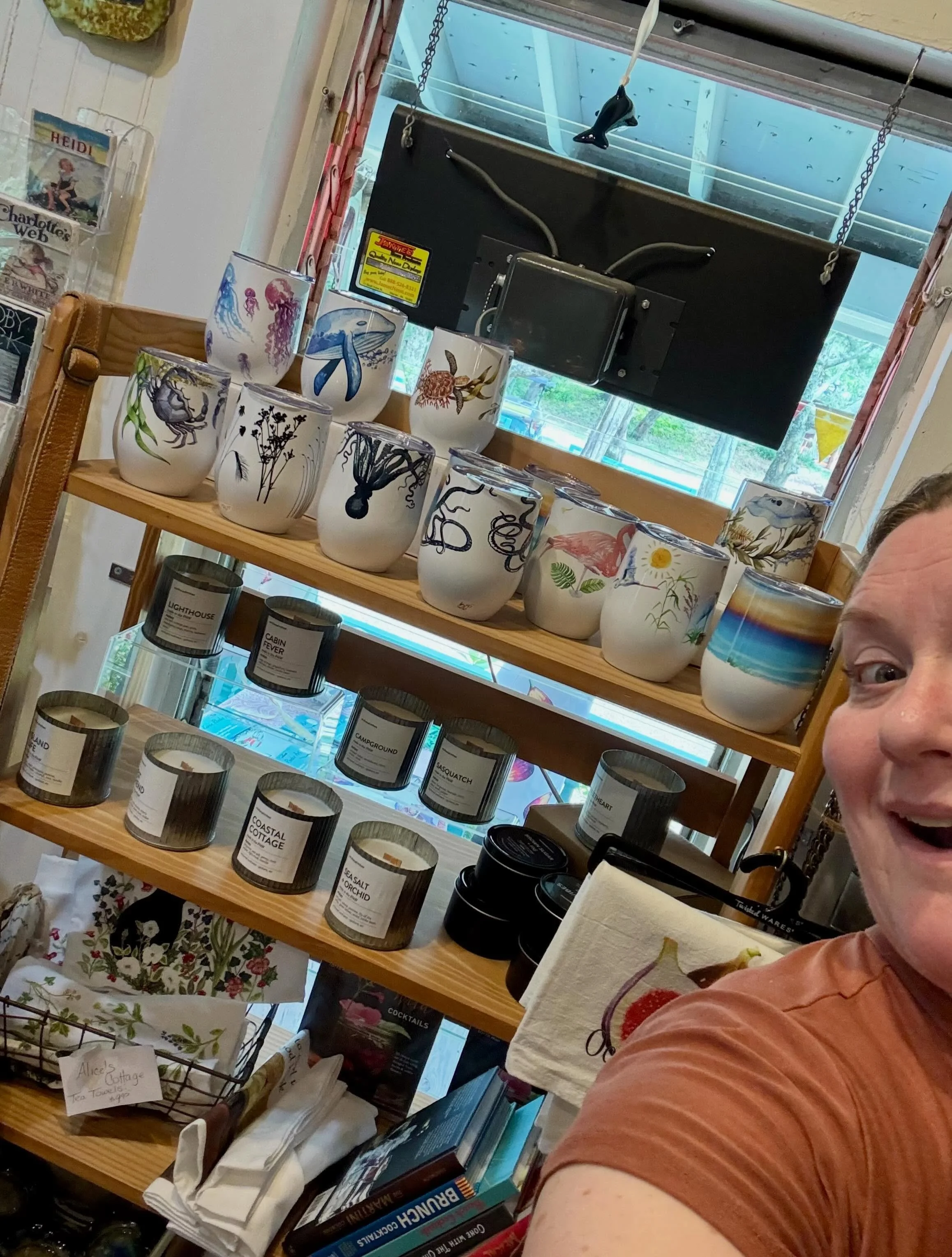 One of my favorite things about what I do is getting to visit shops that carry my products and meet my retail partners face to face while on vacation with my family! Spotting The Traveled Lane cups at @bookstobered on Ocracoke Island, NC while vacati