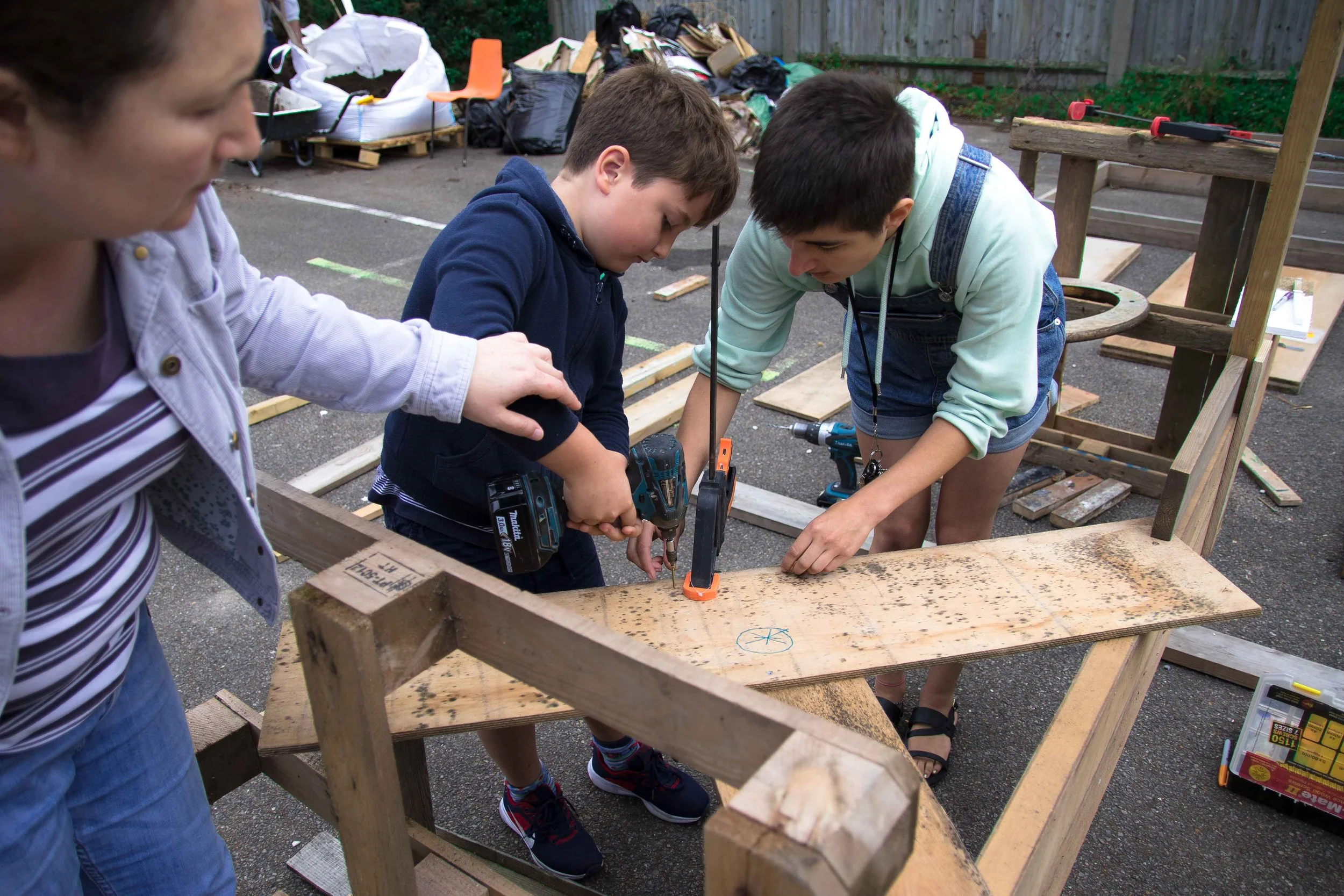 A child building a structure at the Beacon Garden Workshop at The White House