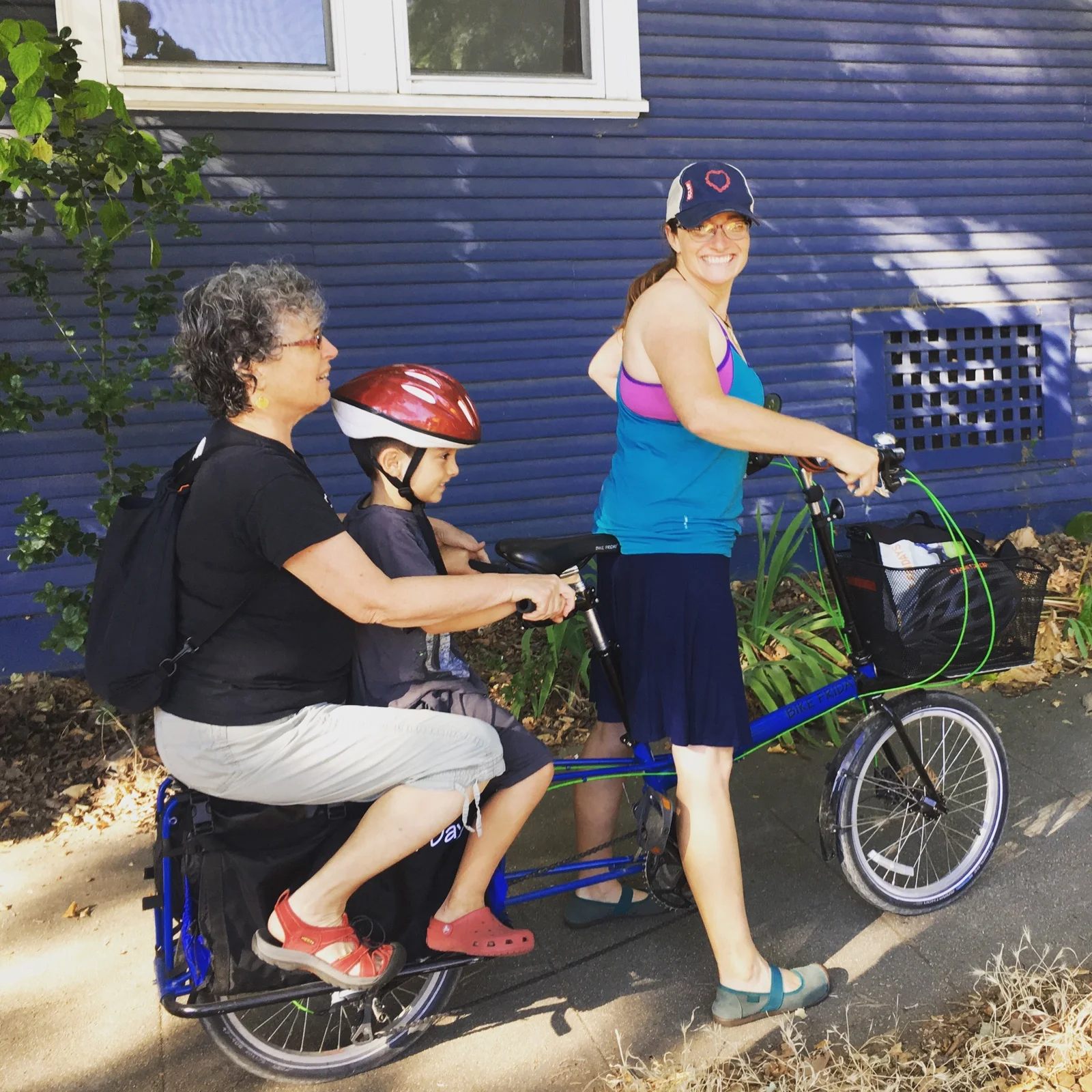 Laurie grabbing a lift with daughter Elle and one of her grandsons.
