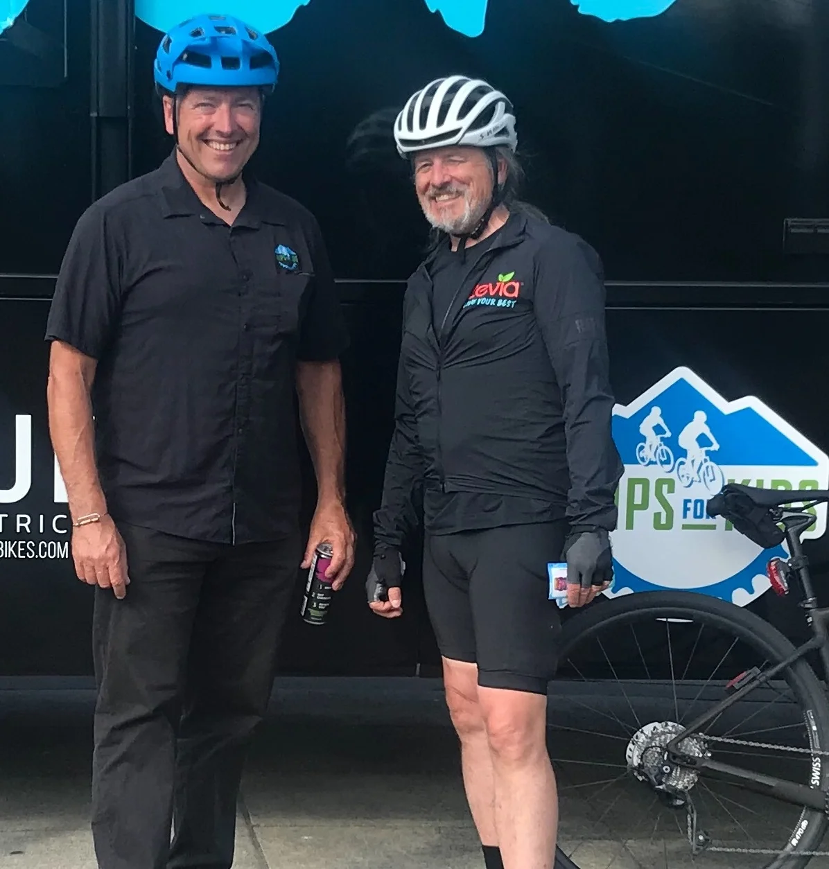 Trips for Kids Executive Director, Robert Ping, posing with Zevia's Chief Strategy Officer and EVP of Sales and Marketing, Robert Gay in Seattle
