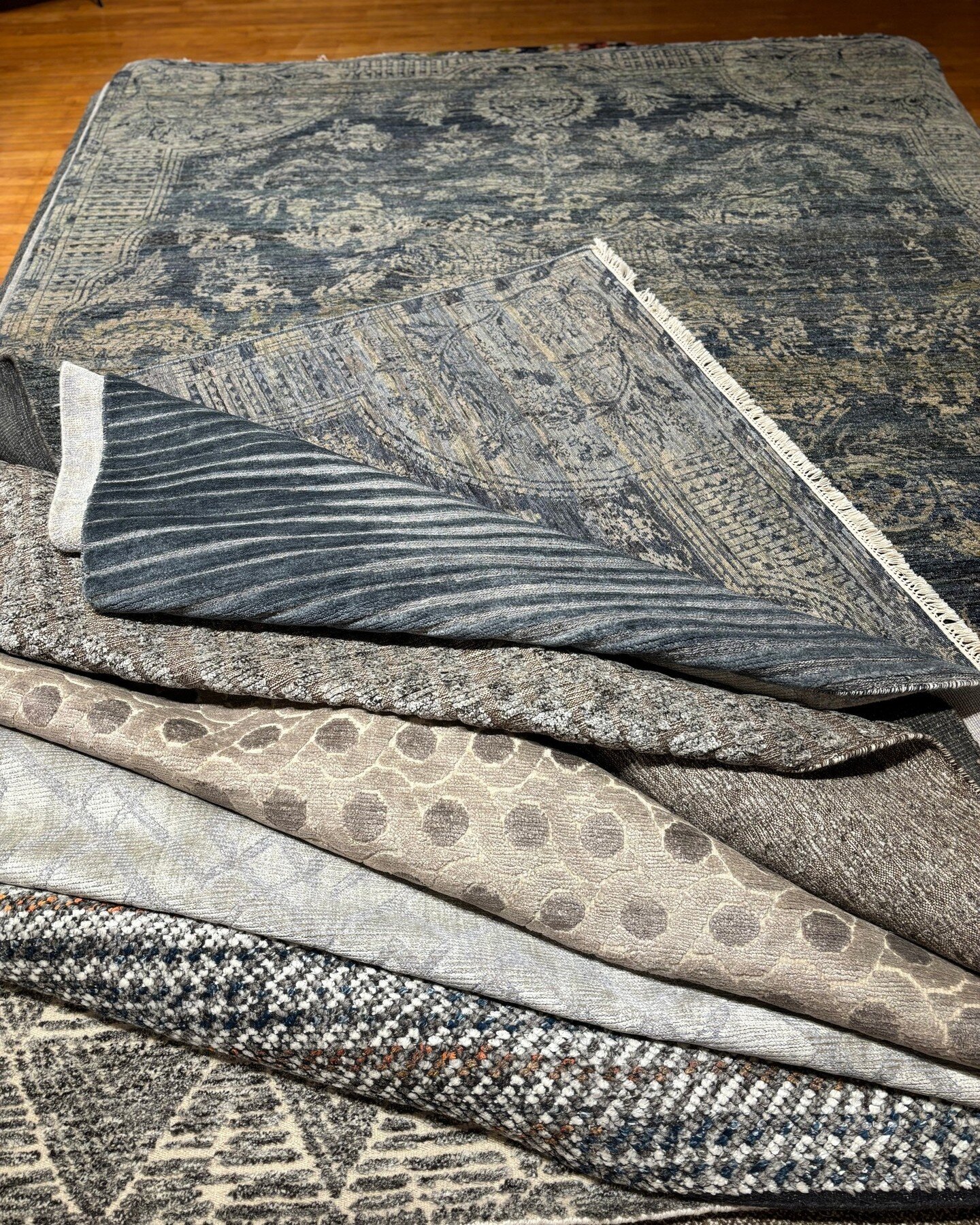 We like to group our rugs together by color palette. When we find a color range that works with your home, we then narrow it down by design and texture. 

We then schedule an in-home showing with the final candidates. The choice is ready once you see