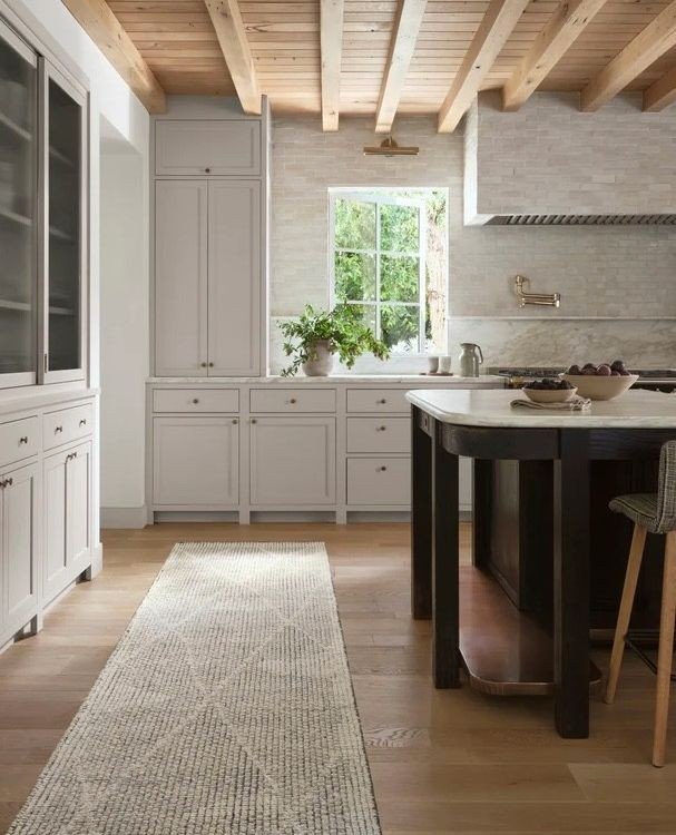 Soft under foot, the Bella runner takes you and your coffee right to the window of this this amazing kitchen. I do love the ceiling in this kitchen!⁠
⁠
Hand-knotted of wool, this runner comes in a few different lengths.⁠
⁠
Visit us in our State Colle