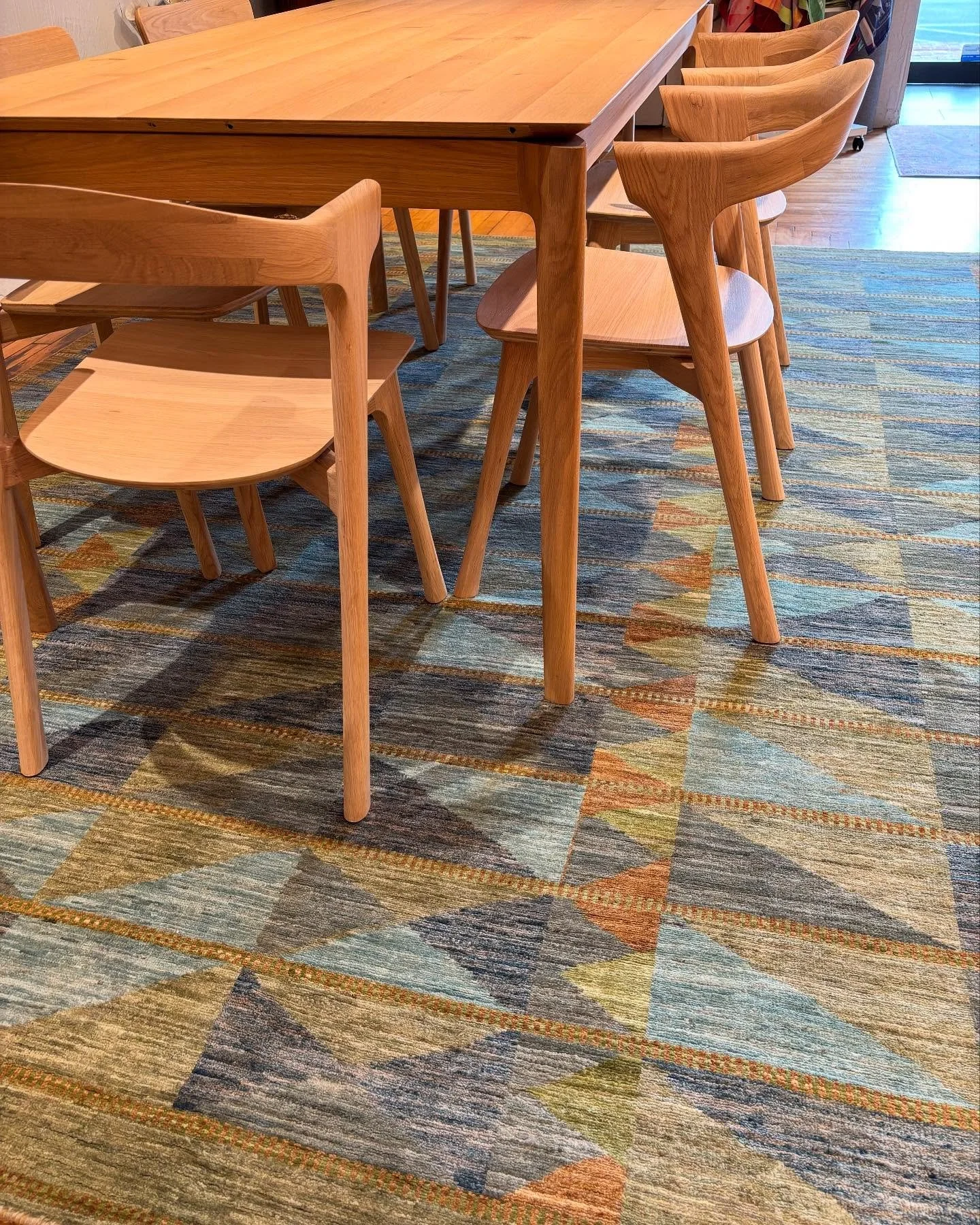 Scandinavian design elements have inspired our newest addition to our Oslo Rug Collection. Handmade with veggie dyes and hand-spun wool. The bok dinning room table is made of white oak and is available in many sizes and is also expandable. Discover e