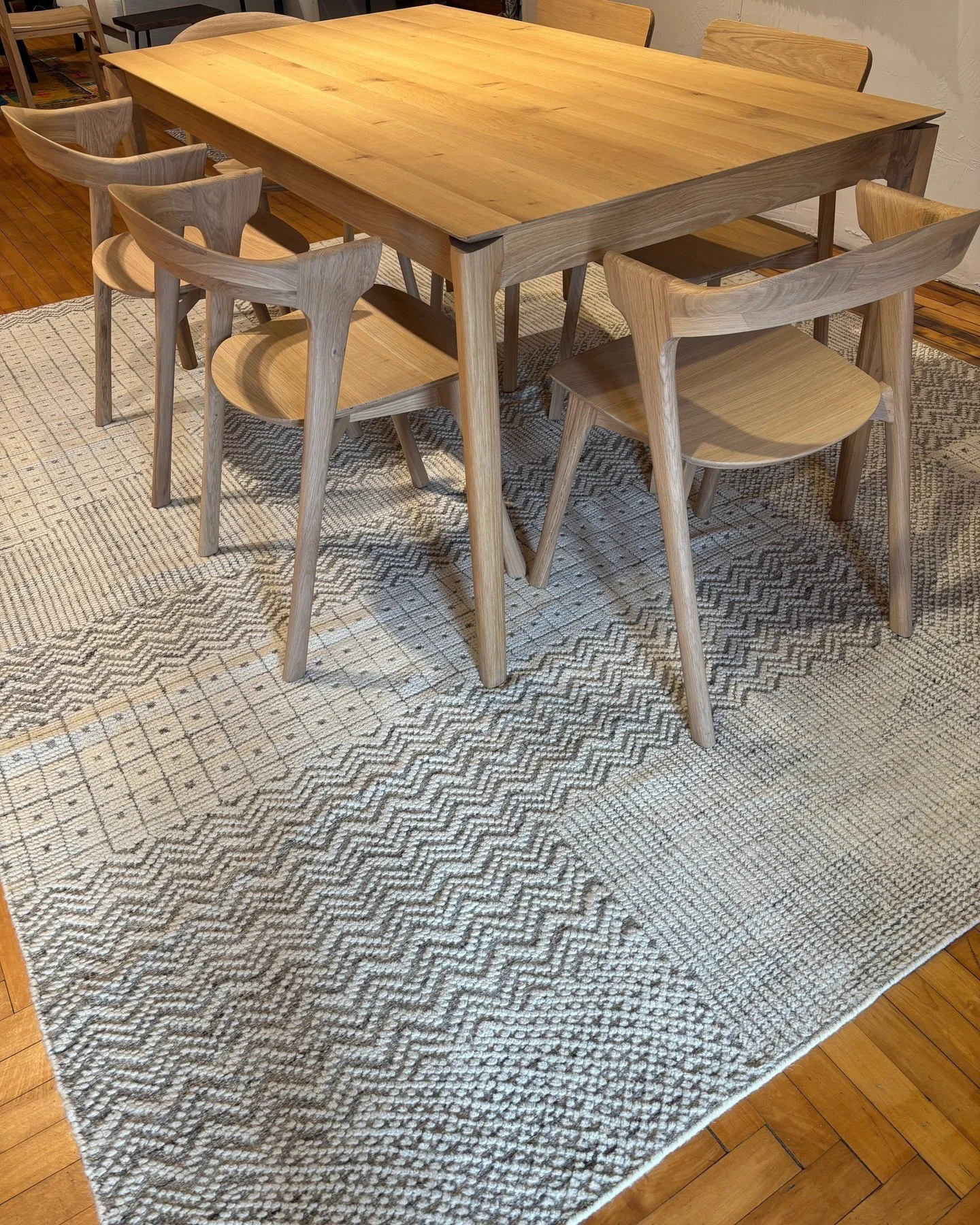 Solid oak and wool! The area rug and table are handmade of entirely of natural materials. This area rug is from our Oslo Rug Collection. The Oslo collection is made of only naturals fibers and available in many sizes. Over the years, the Bok table an