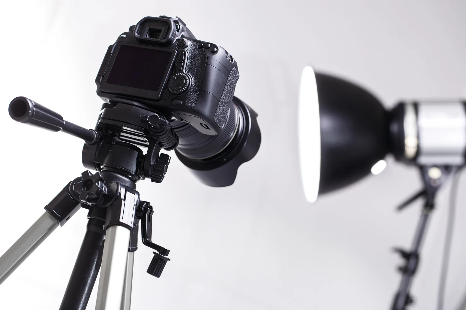 Camera on a tripod in a photo studio for product photography