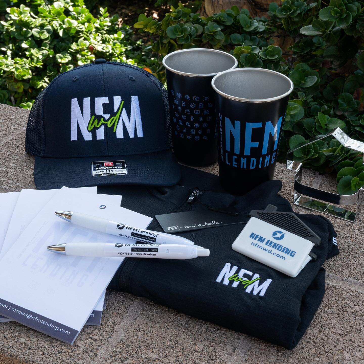 Custom embroidered @travismathew polos, stainless steel insulated pint cups, note pads, house shaped cookie cutters, and chip clips for our friends at NFM Lending 👌🏻🔥