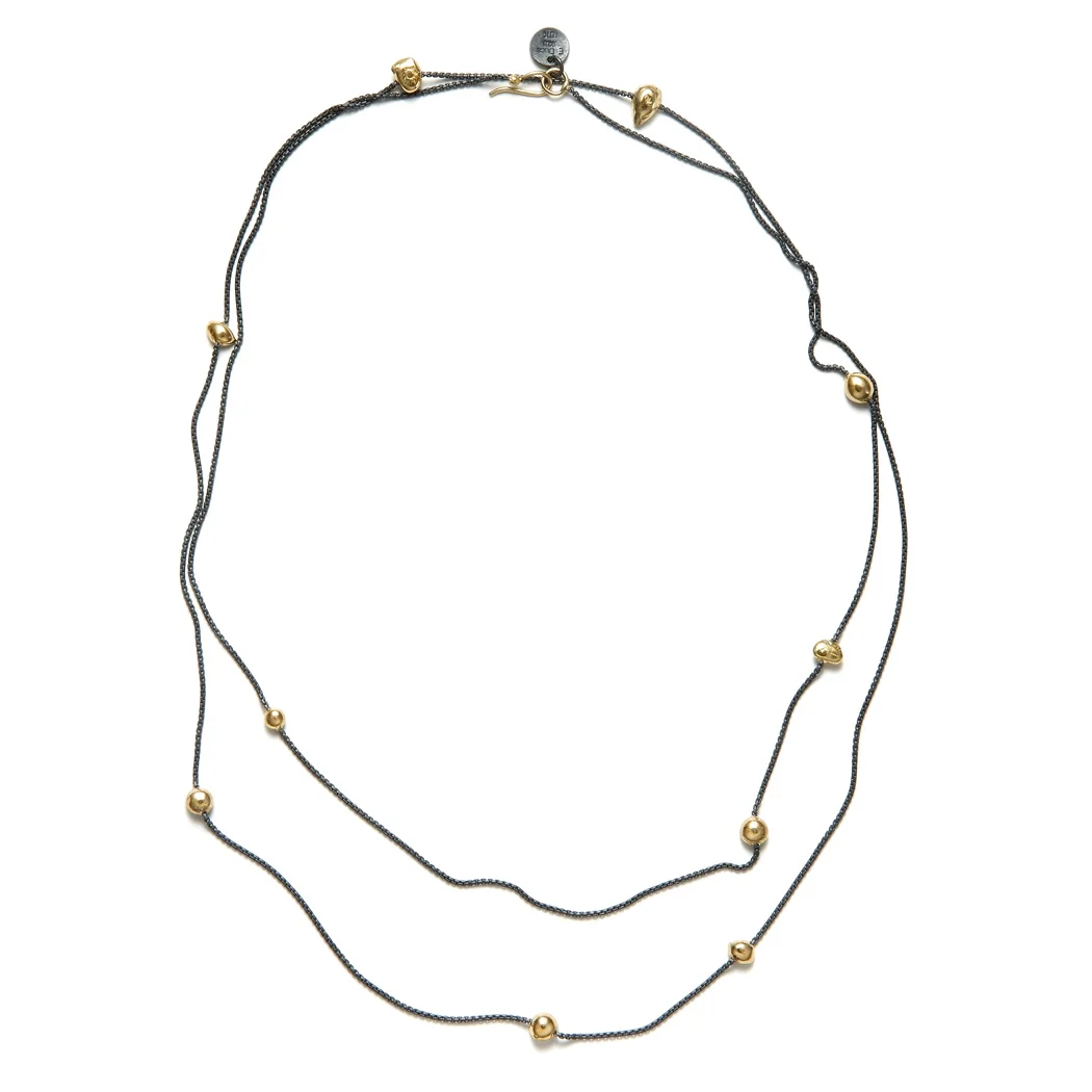 ED85N Floating in the Dark necklace. 18k yellow gold, blackened sterling silver.
