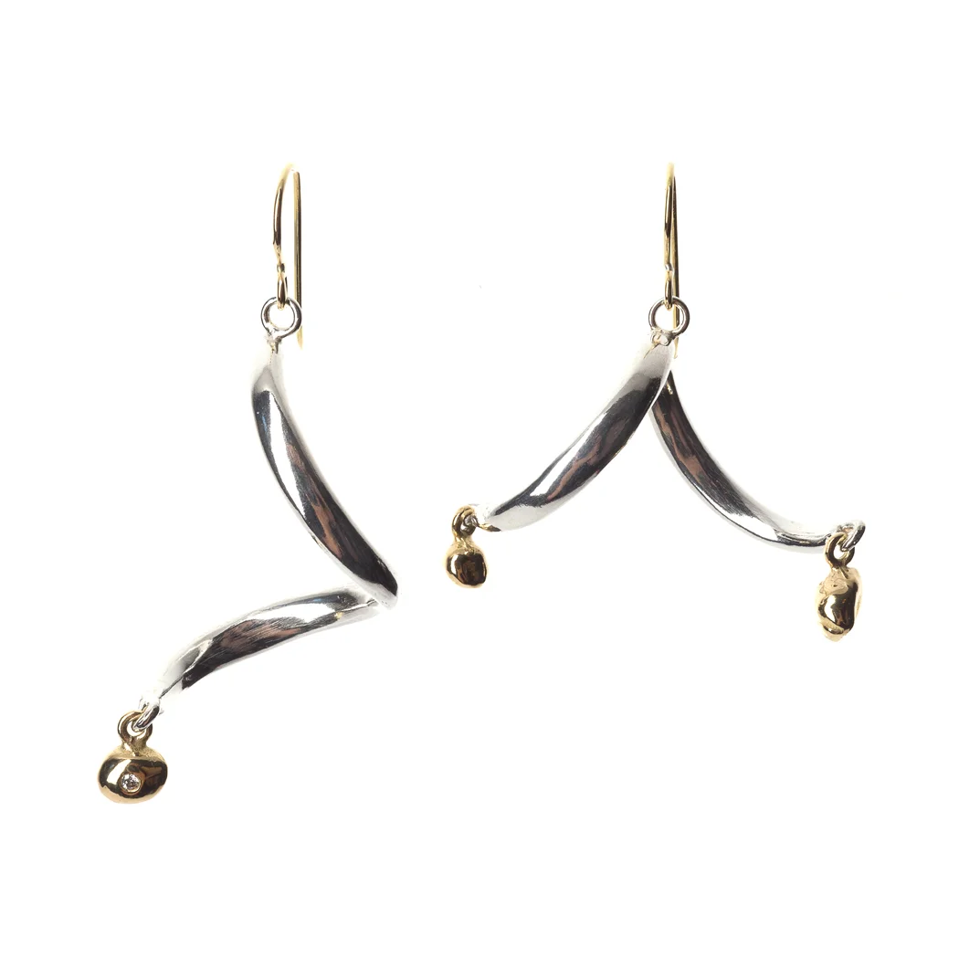 ED105E InsideOut earrings. Sterling silver, 18k yellow gold, white diamonds.