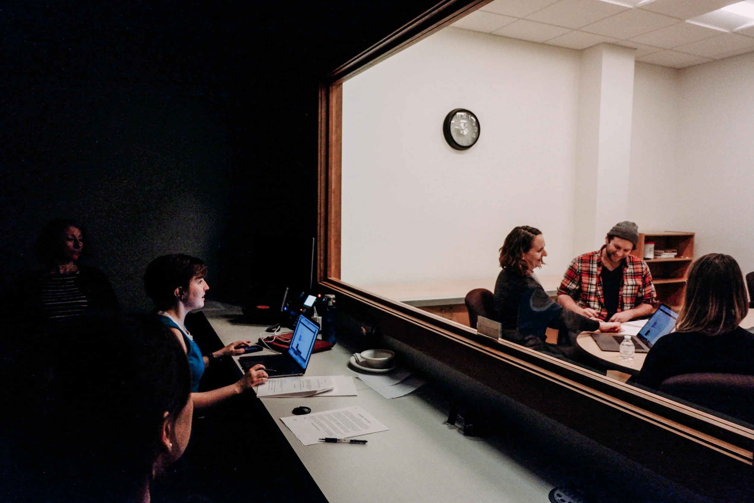 View from behind the two-way mirror during in-lab testing at Fathom Consulting