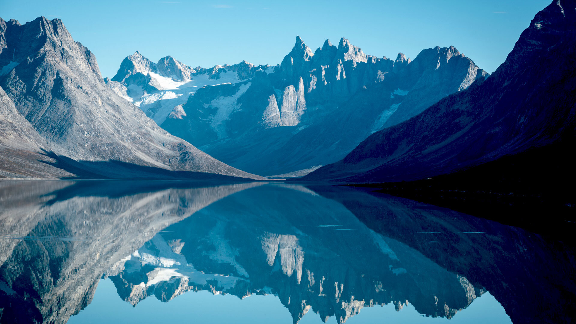 looking-north-during-beautiful-day-towards-three-peaks-mirror-camp-in-tasiilaq-fjord-credit-photo-by-chris-brinlee-jr-visit-greenland.jpg