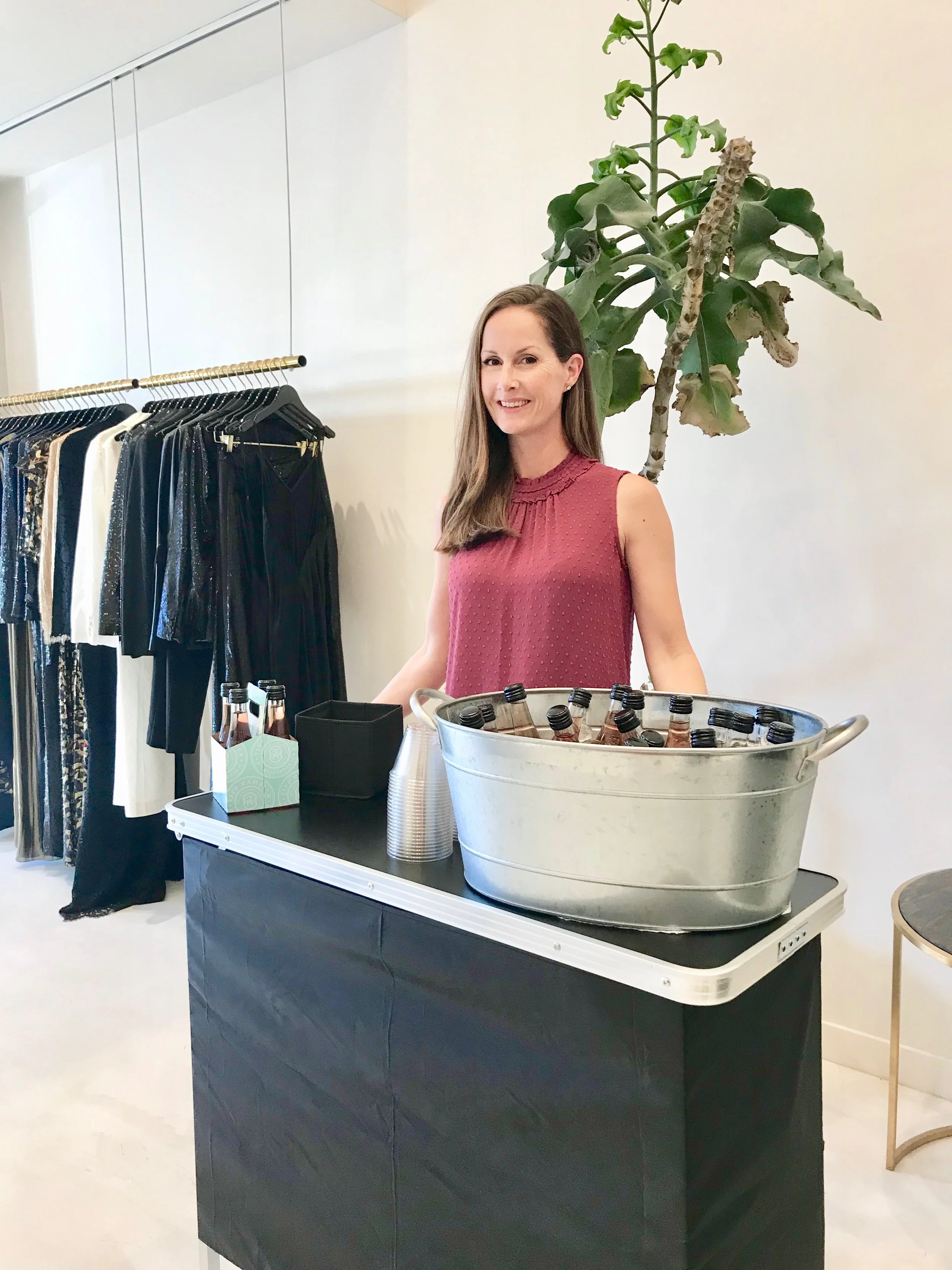 Bartender in clothing boutique