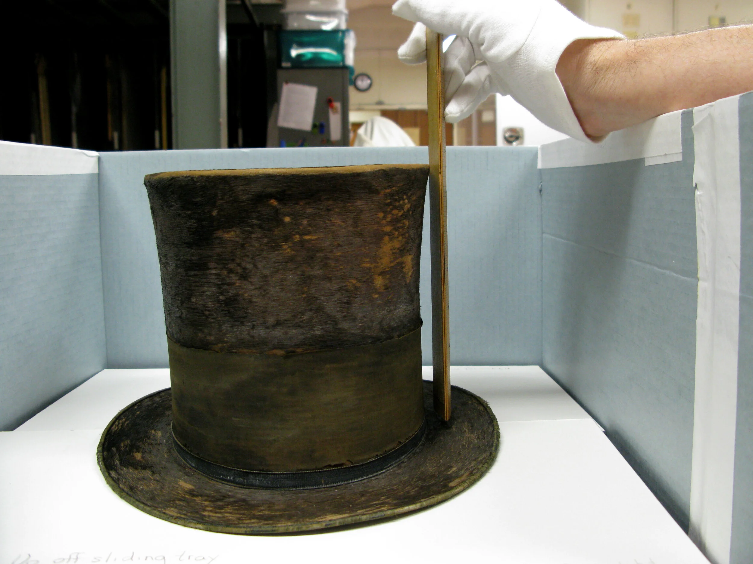Measuring Lincon's Hat at the Smithsonian